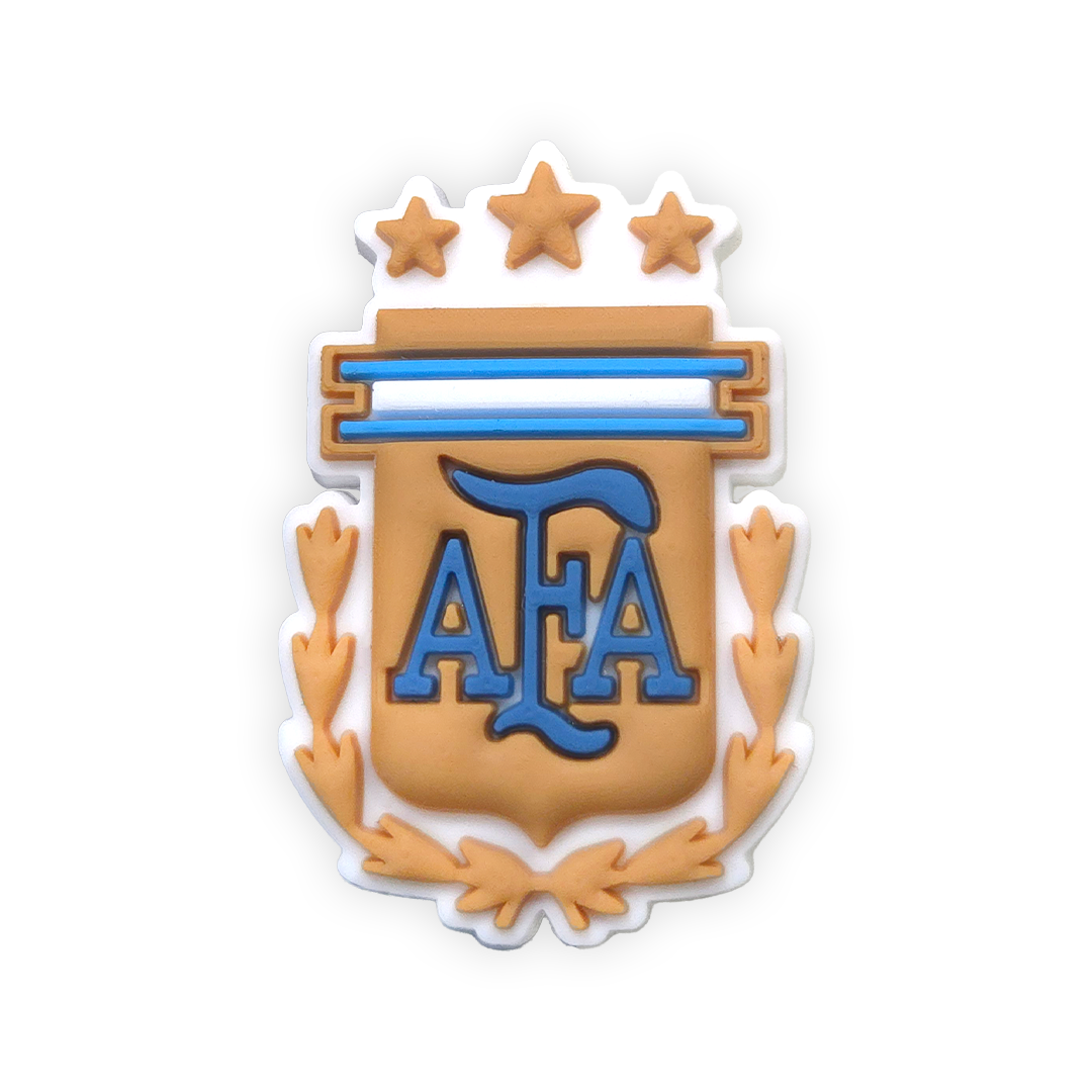A rubber charm of the Argentina National Football Team (AFA) logo featuring three stars, blue and white stripes, AFA initials, and a laurel wreath.