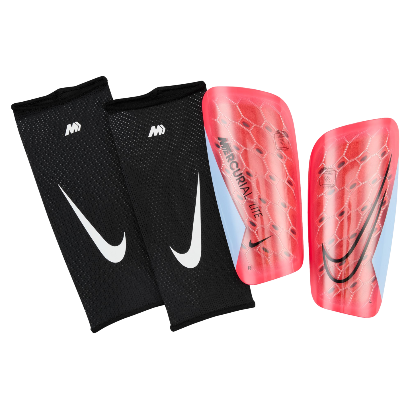 A pair of red Nike Mercurial Lite soccer shin guards next to two black mesh sleeves with white Nike swooshes, all set against a black background.