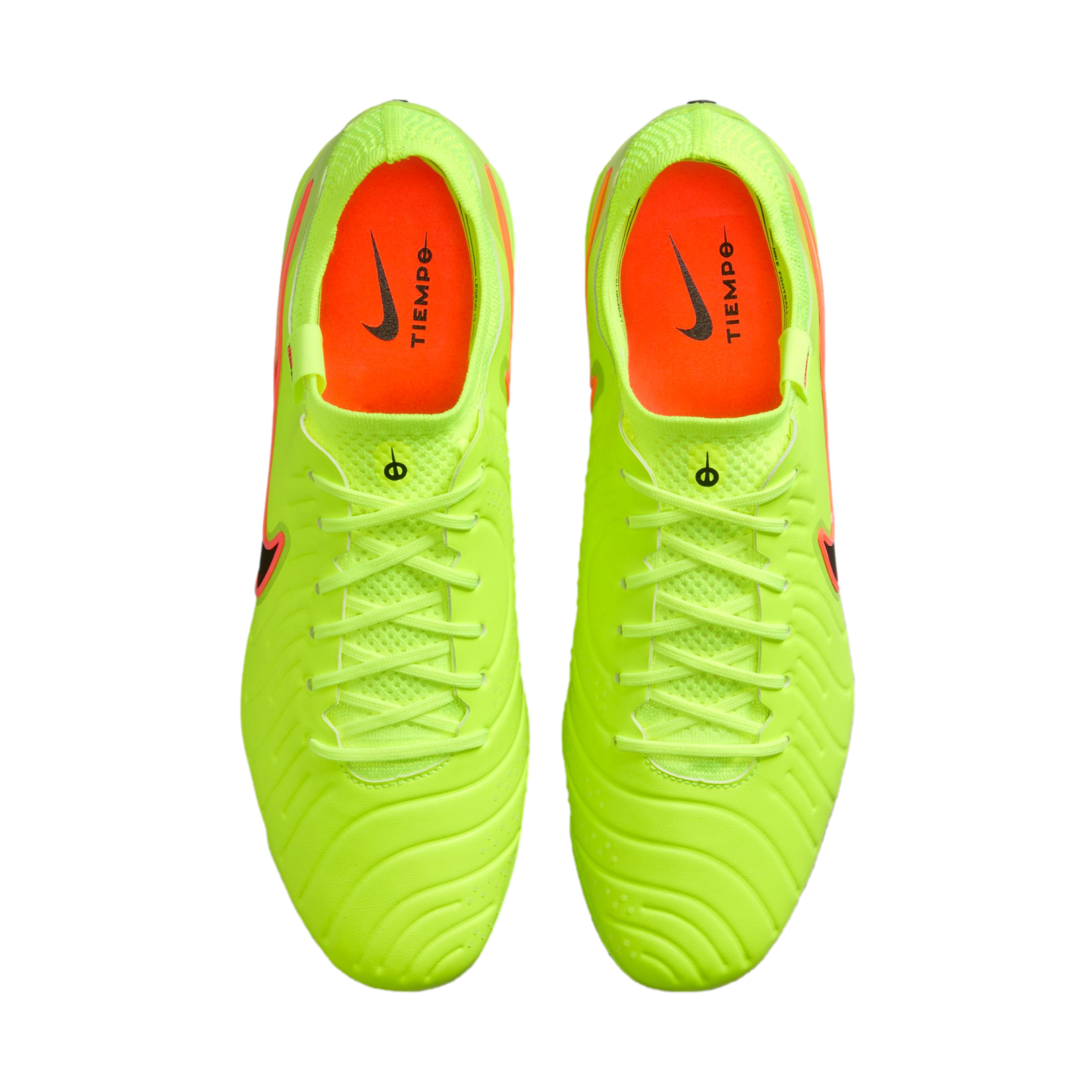 Aerial view of a pair of bright lime green Nike Tiempo soccer cleats with orange interiors, centered against a solid black background.