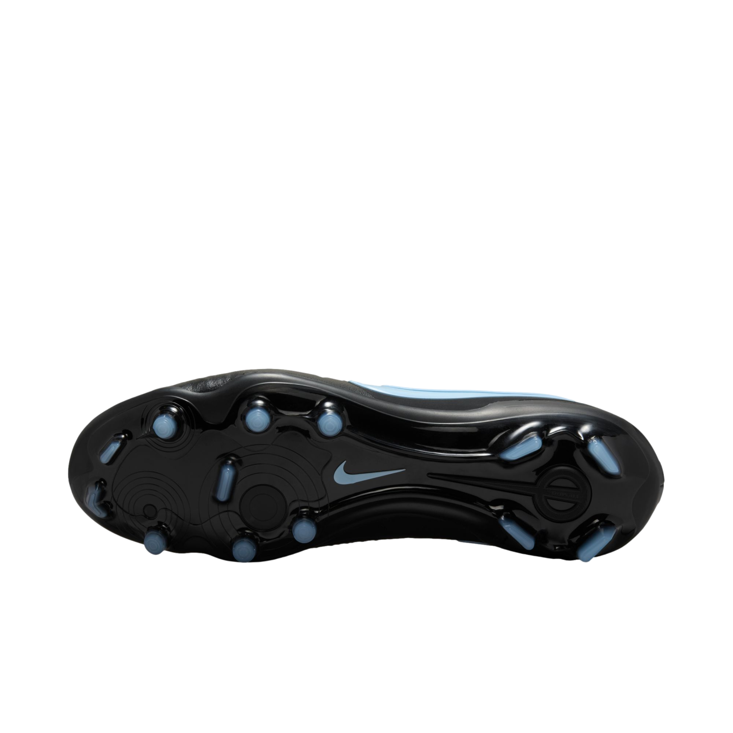 Soleplate of a black Nike soccer cleat featuring light blue studs and a matching swoosh on a black background.
