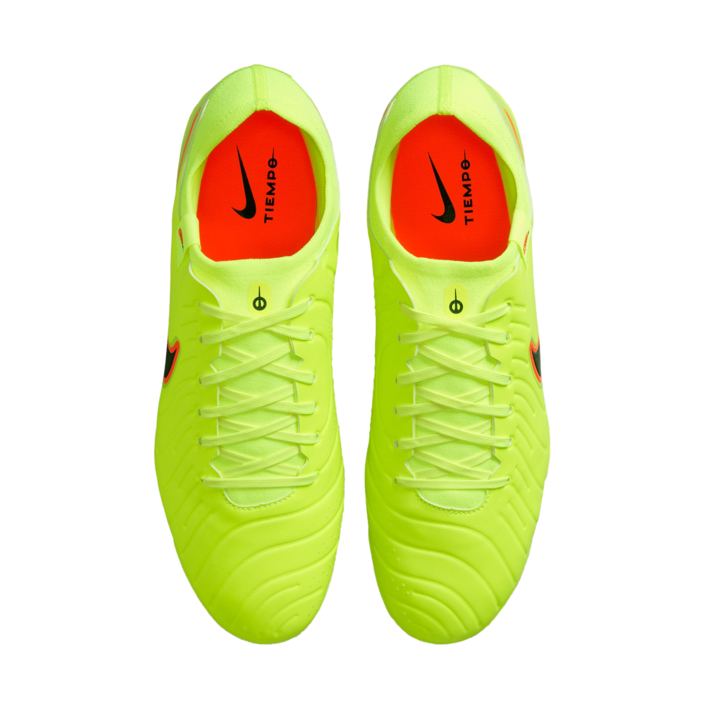 Top-down view of neon yellow Nike Tiempo soccer cleats with bright orange interiors against a black background.