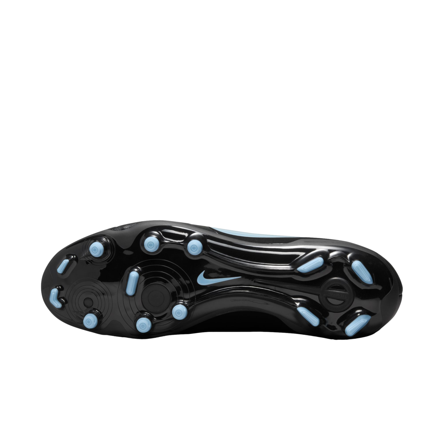 The bottom view of a black, glossy Nike soccer cleat with light blue studs and a matching Nike swoosh logo in the center, set against a black background.