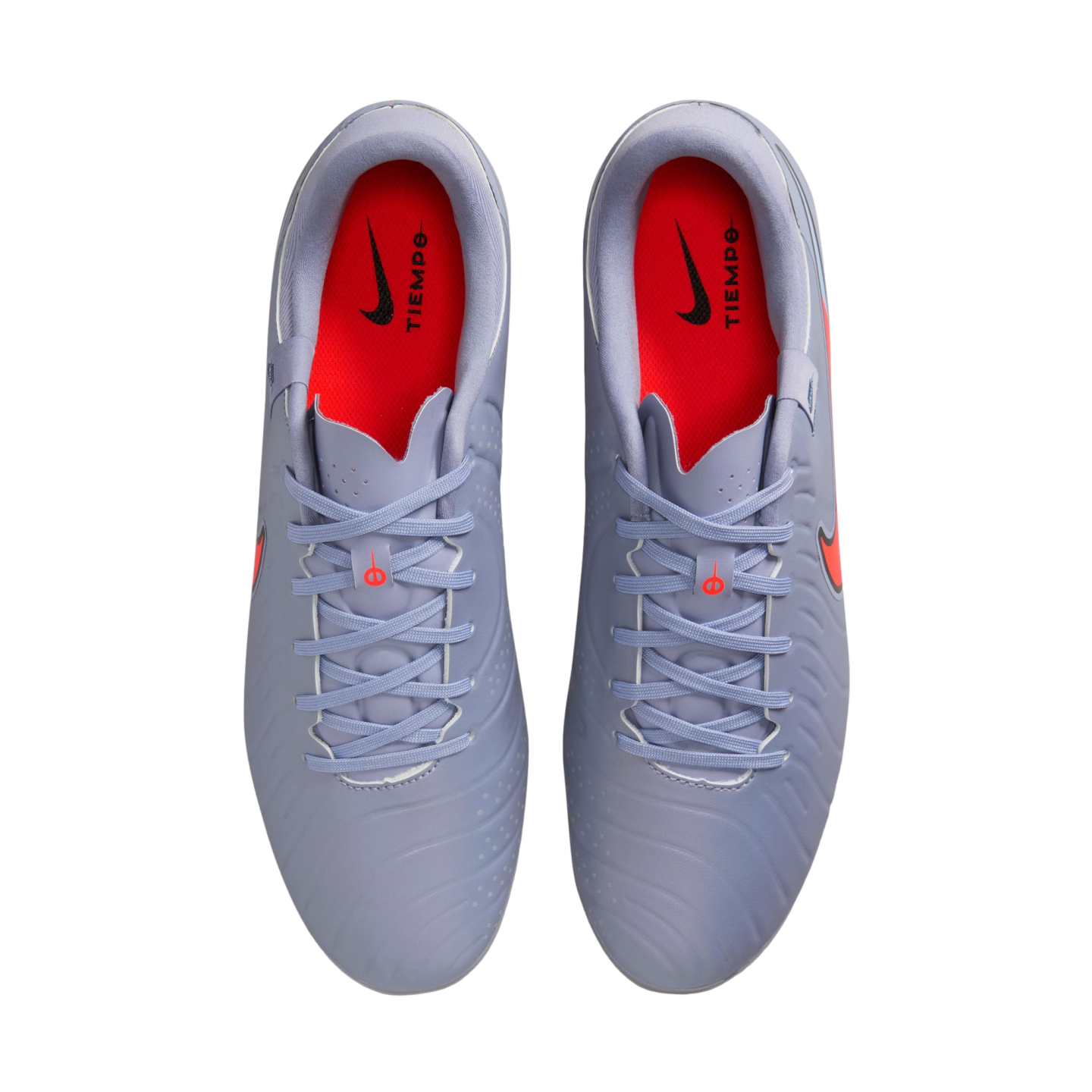 Top-down view of light blue Nike Tiempo soccer cleats with bright orange insoles and matching light blue laces against a black background.
