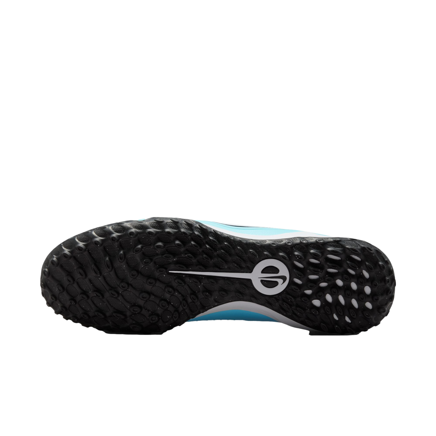 Bottom view of a light blue Nike turf shoe showing its black, studded rubber outsole and central white logo.