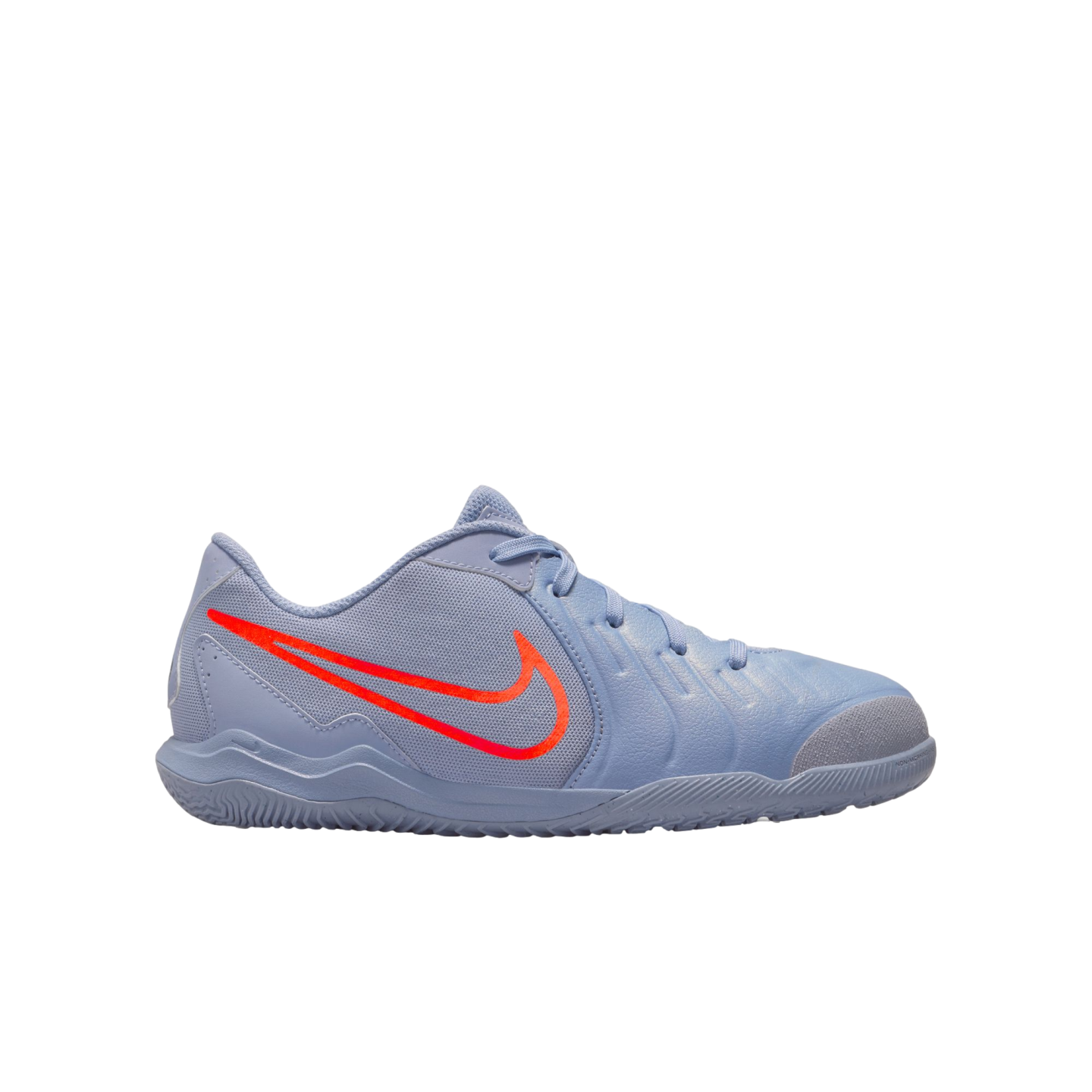 Light blue Nike indoor soccer shoe with a vibrant orange swoosh logo against a solid black background.