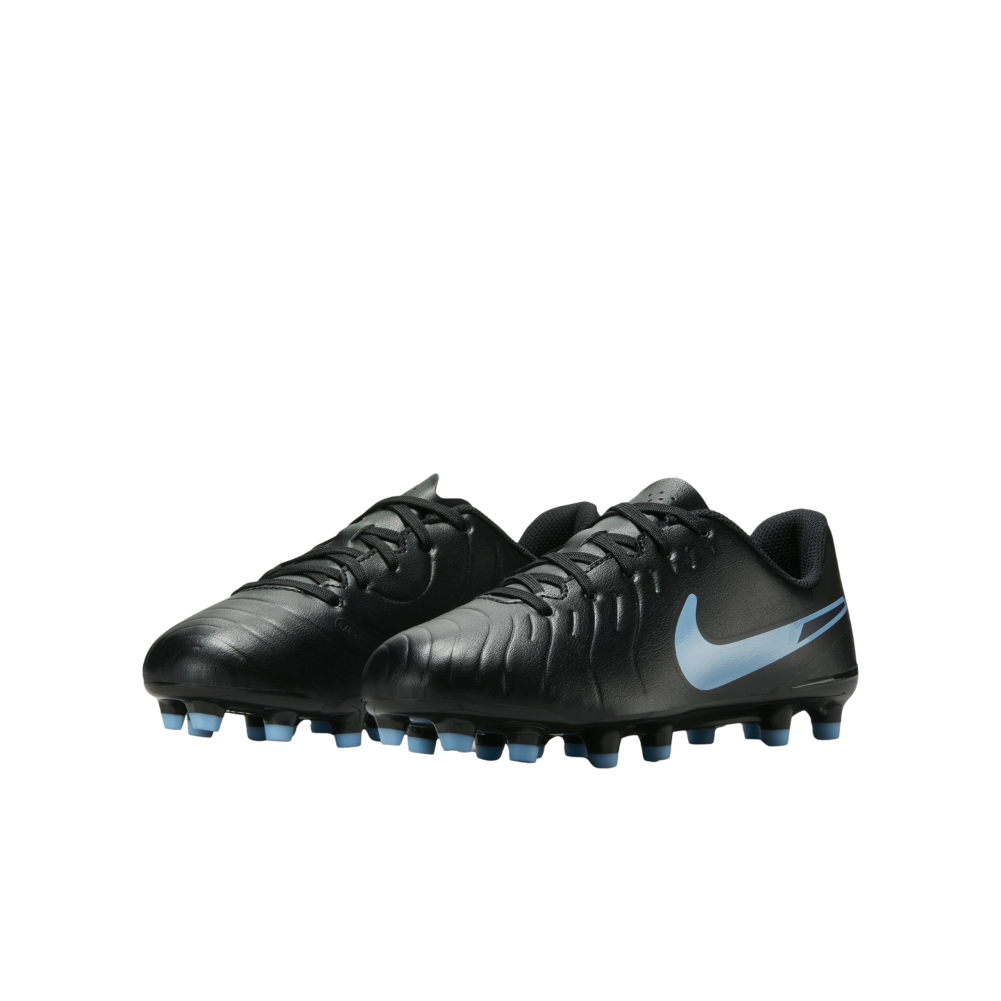 A pair of black Nike soccer cleats featuring a light blue Nike swoosh and light blue studs, set against a solid black background.