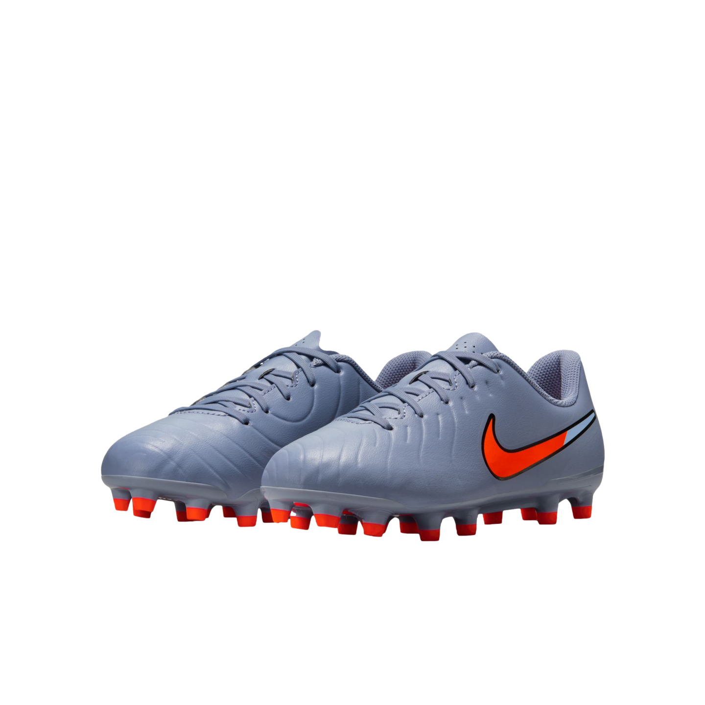 Pair of grey Nike soccer cleats with bright orange studs and an orange swoosh logo, shown against a black background.