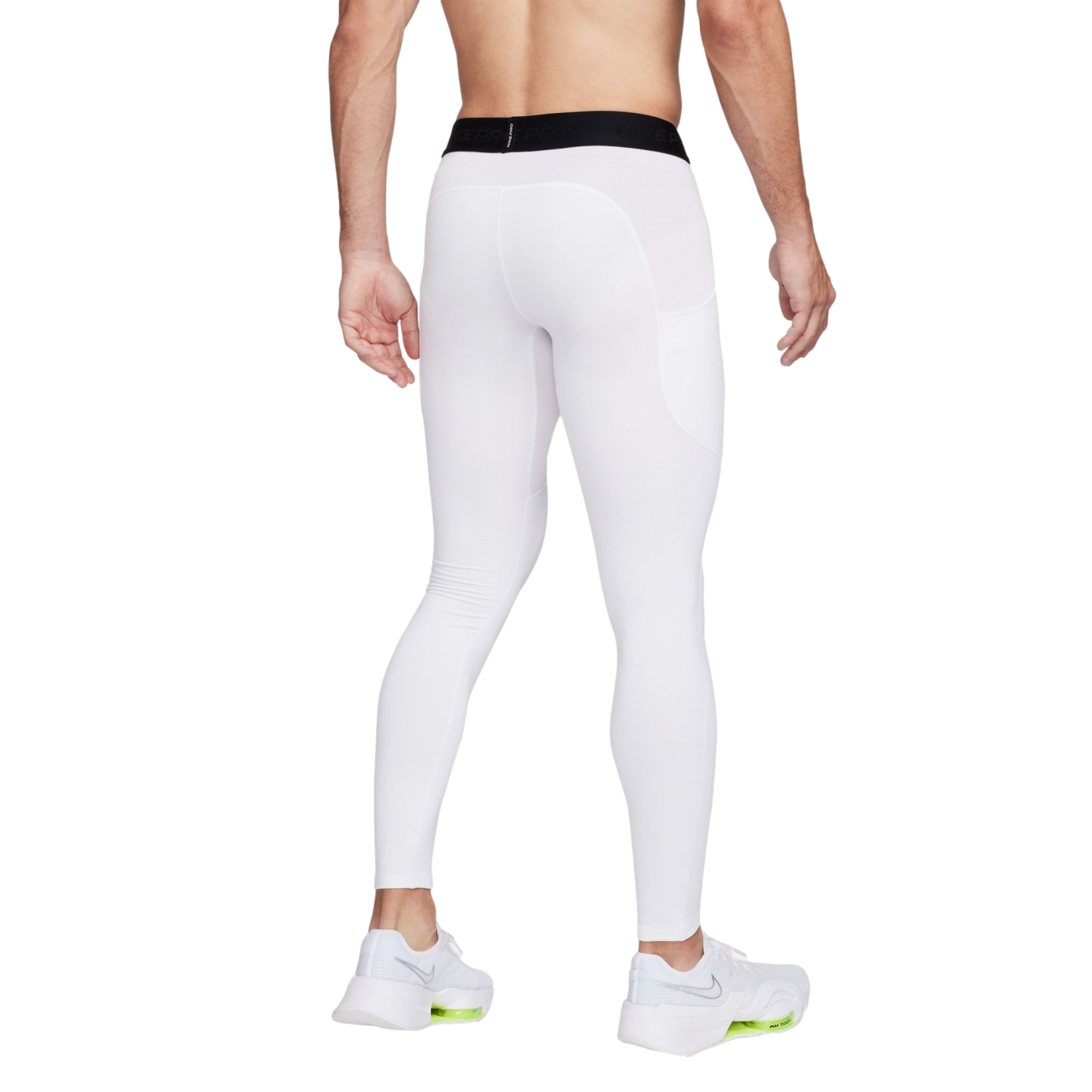 Rear view of a person in white Nike Pro compression leggings with a side pocket and white athletic sneakers, shown against a white background.