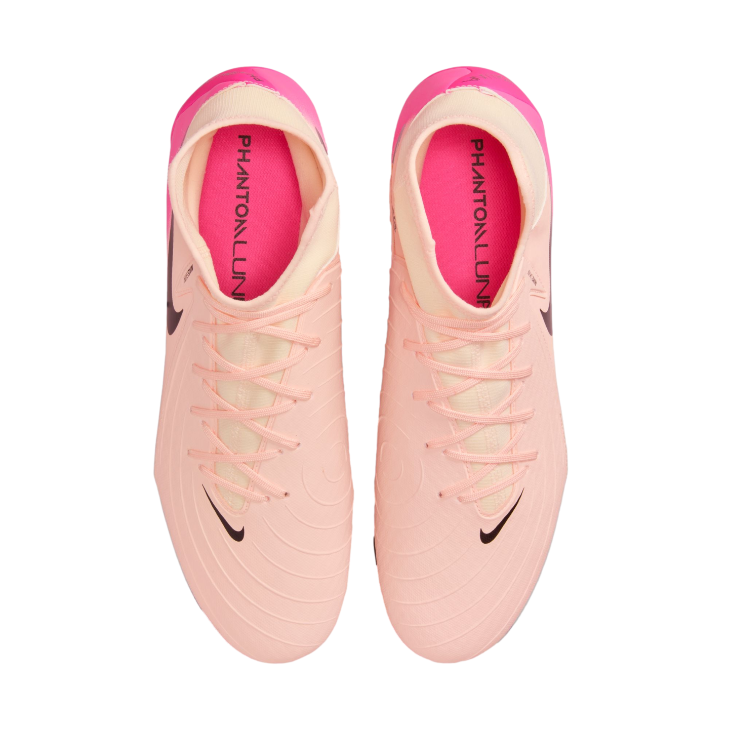 Top-down view of peach and pink Nike Phantom Luna soccer cleats featuring a sock-like collar and black Nike swooshes on a white background.