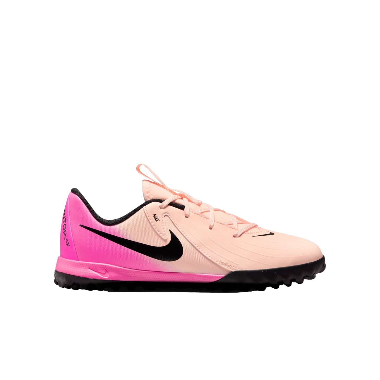 Nike Phantom GX turf soccer shoe with a pink and peach gradient upper, black Swoosh logo, and black studded outsole.
