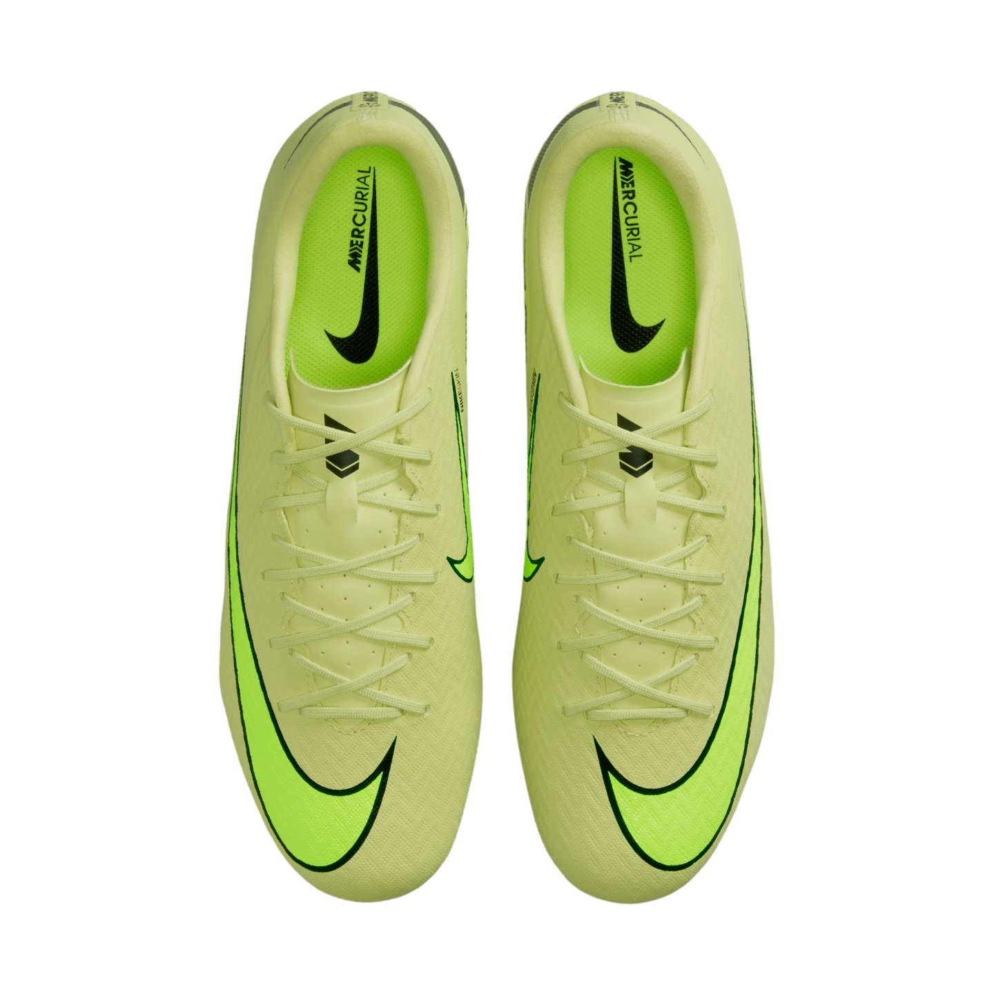 A top-down view of a pair of lime green Nike Mercurial soccer cleats with black swooshes and neon green accents against a black background.