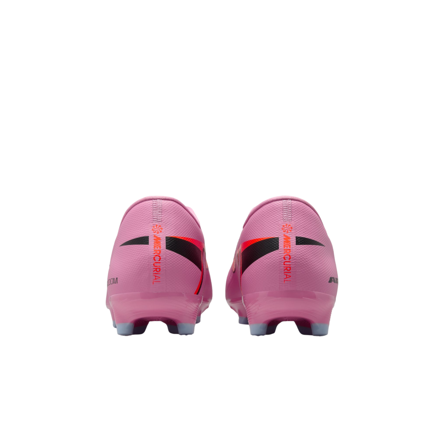 Rear view of a pair of pink Nike Mercurial soccer cleats with red and black details against a black background.