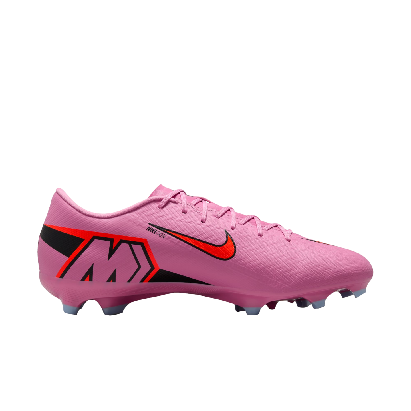 Side view of a pink Nike Mercurial soccer cleat with black and orange accents, including a Nike swoosh and a large "M" logo on the heel, against a black background.