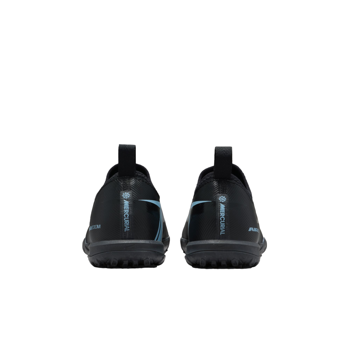 Rear view of black Nike Mercurial turf soccer shoes with teal accents, featuring "MERCURIAL" branding on the heel pull tabs, set against a solid black background.