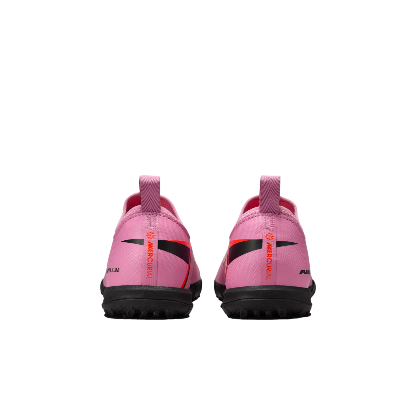 Rear view of two pink Nike Mercurial soccer shoes with black soles and vertical orange branding on the heels against a black background.