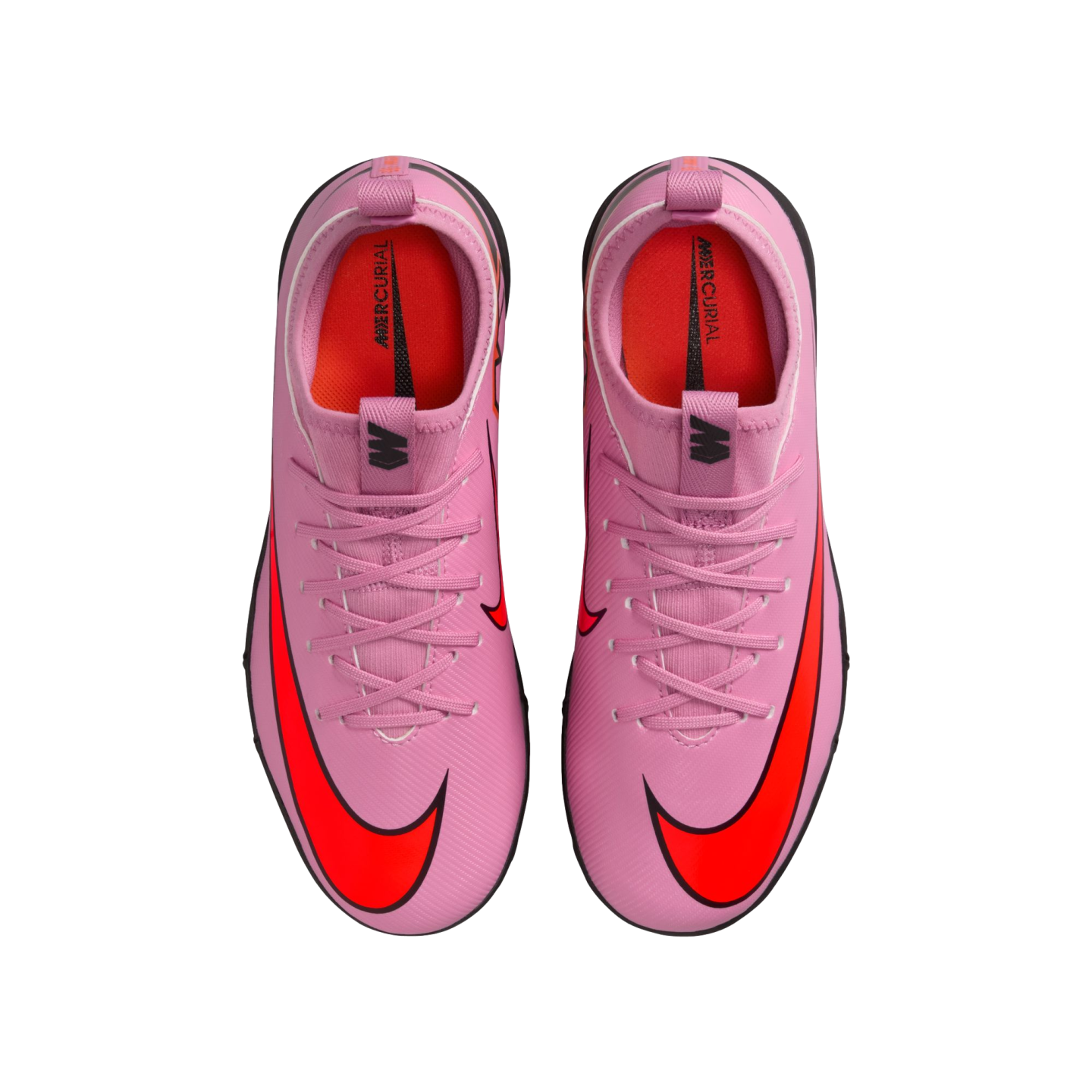 Top-down view of a pair of pink Nike Mercurial soccer cleats with bright orange swooshes on a black background.