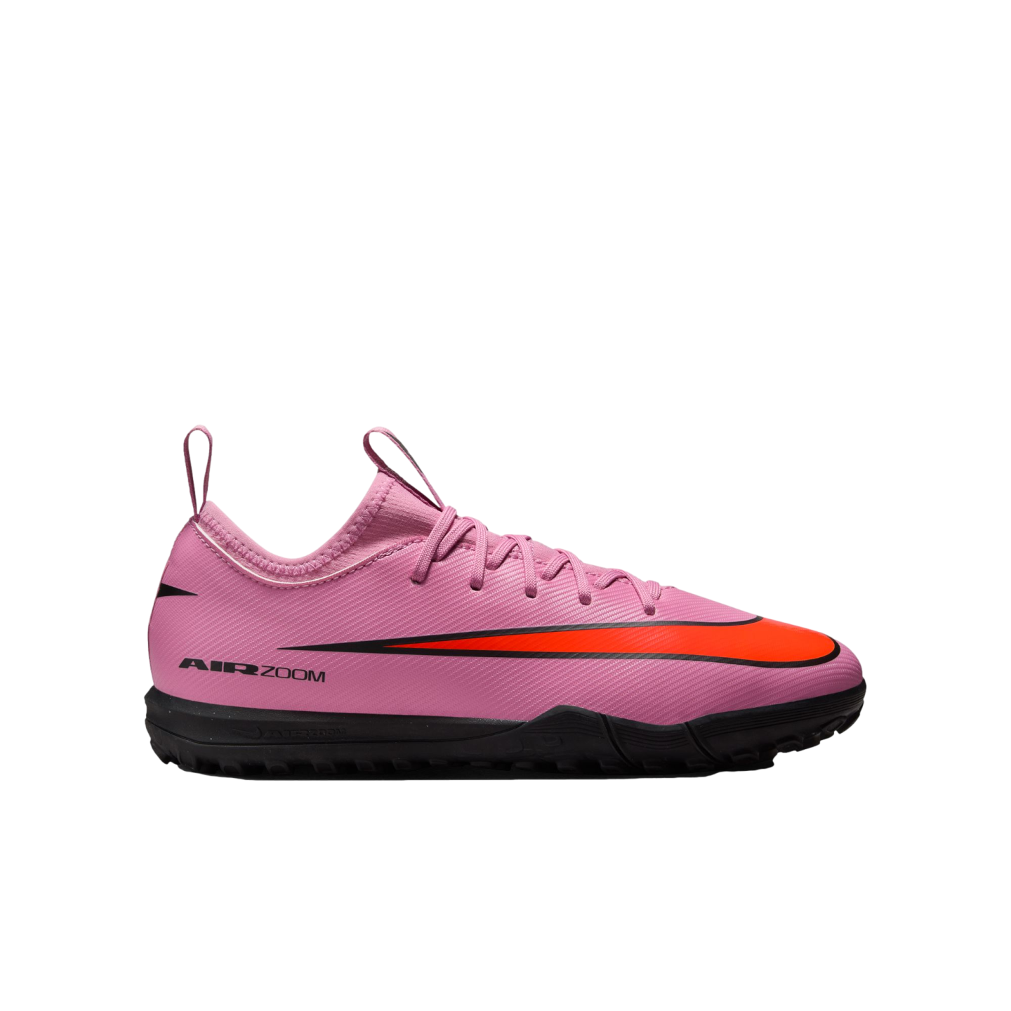A pink Nike Air Zoom soccer shoe with a vibrant orange swoosh and black sole, shown in profile against a black background.