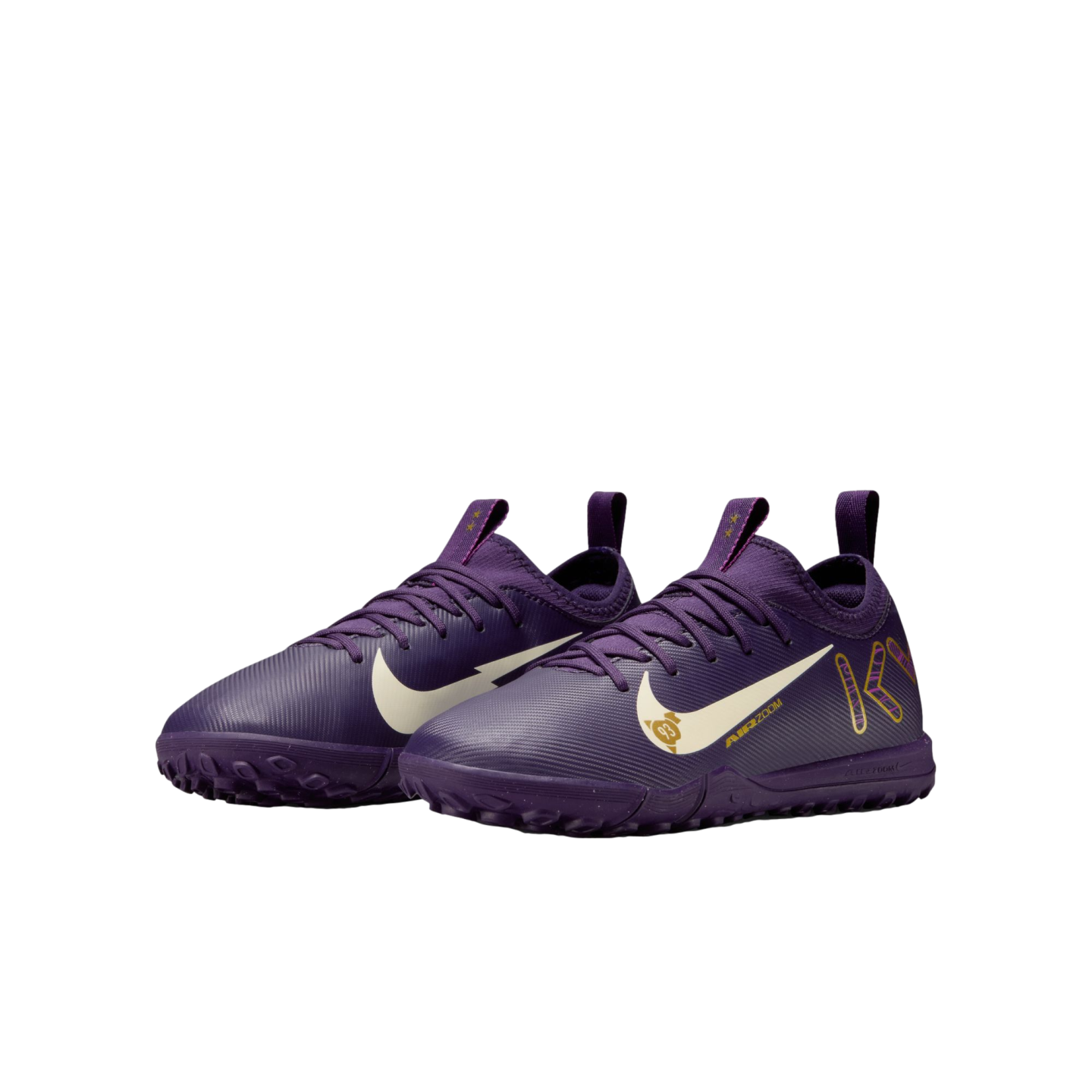 A pair of purple Nike soccer shoes with a pale yellow swoosh and gold accents, designed for turf or indoor play.