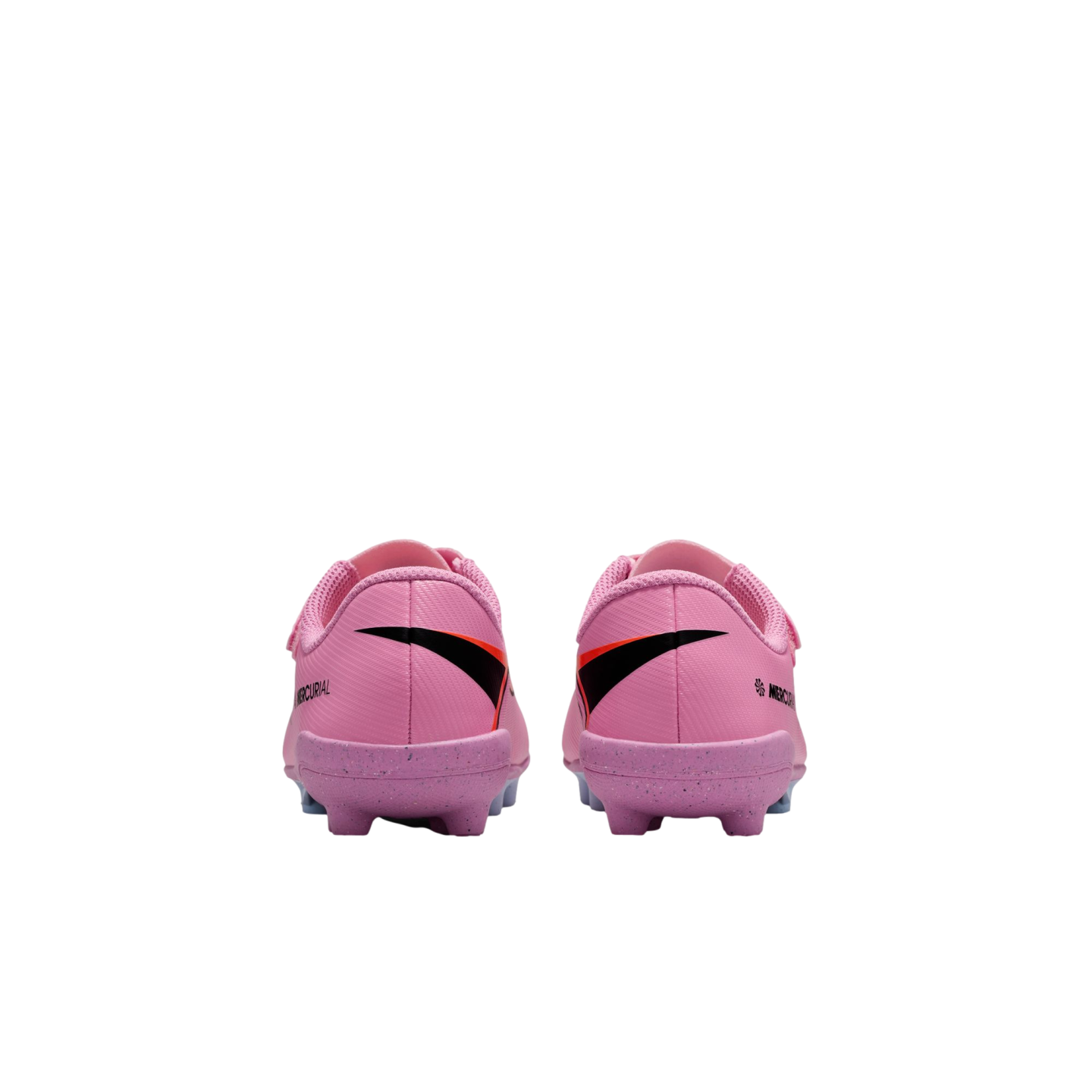 Rear view of a pair of pink Nike Mercurial soccer cleats against a black background, showing black swoosh accents and speckled pink soles.