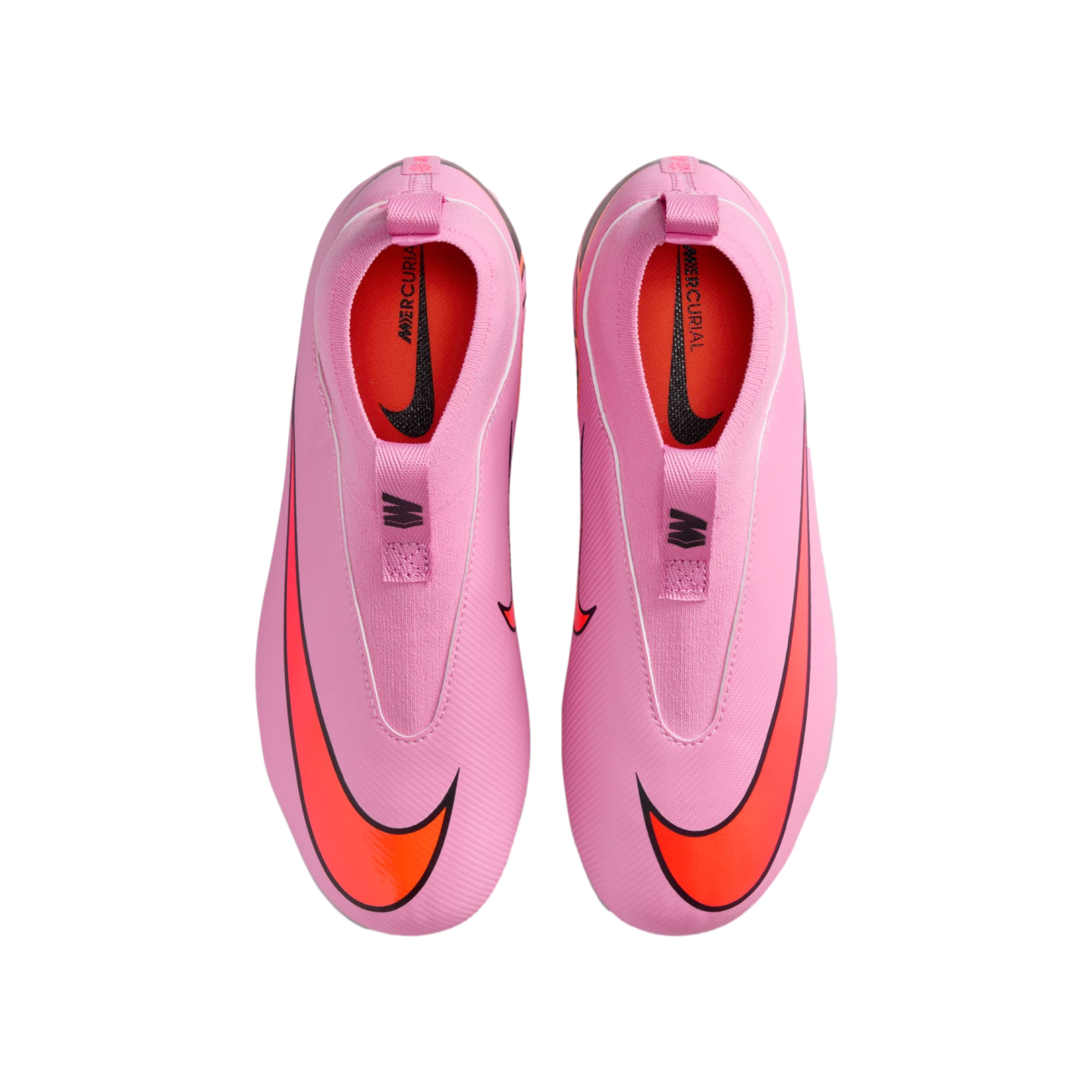 Top-down view of pink laceless Nike Mercurial soccer cleats with large orange swooshes on a black background.