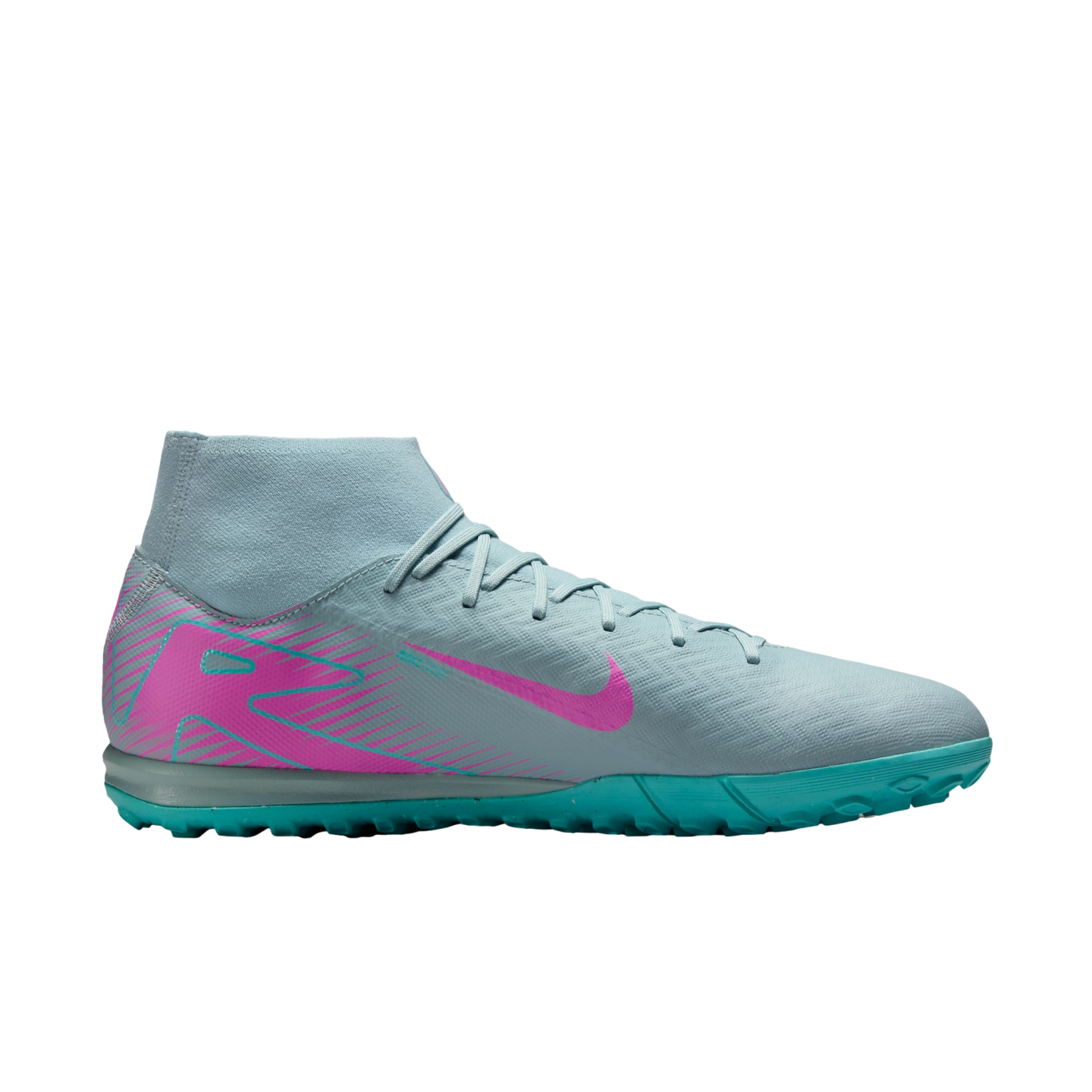 A light blue Nike soccer turf shoe featuring a high-top ankle collar, pink Nike swoosh and heel graphic, and a teal studded outsole.