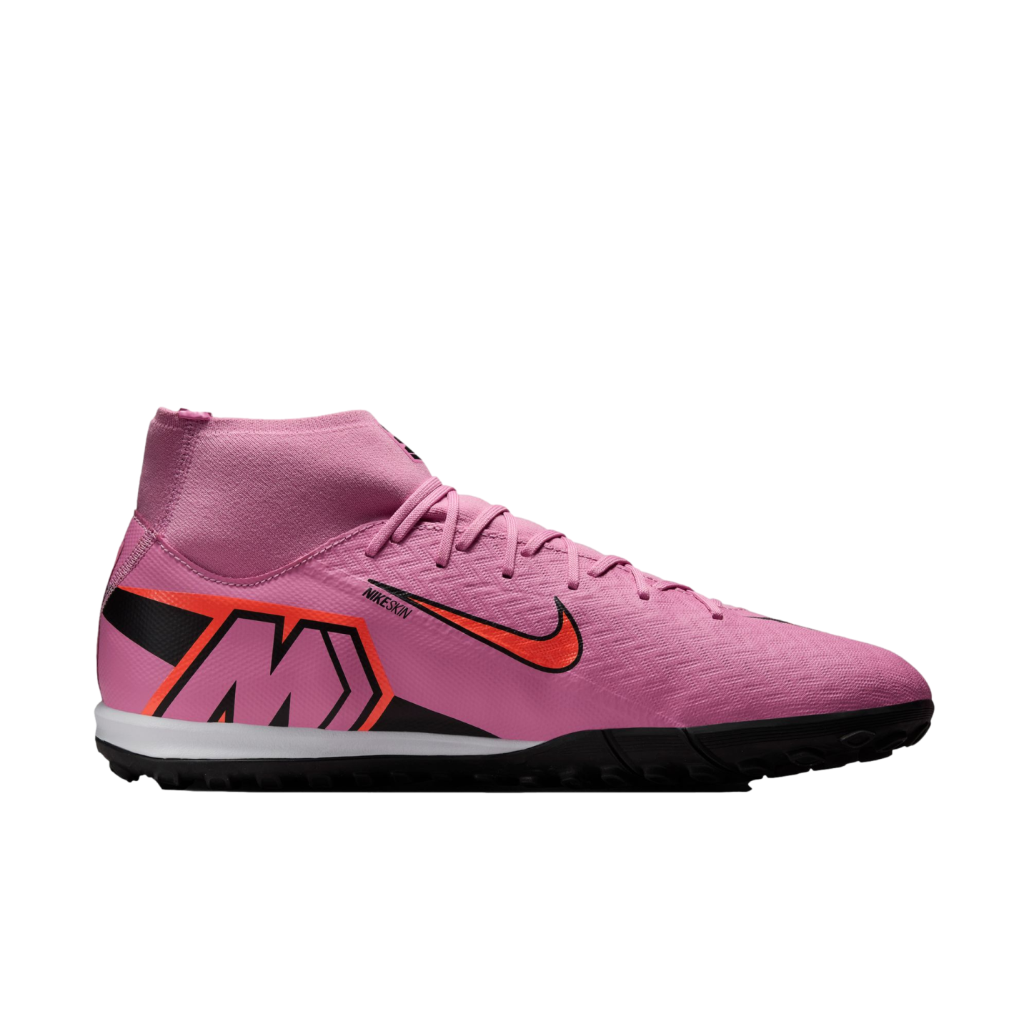Pink Nike soccer shoe with a high-top collar, orange swoosh, and large "M" logo on the heel, set against a black background.