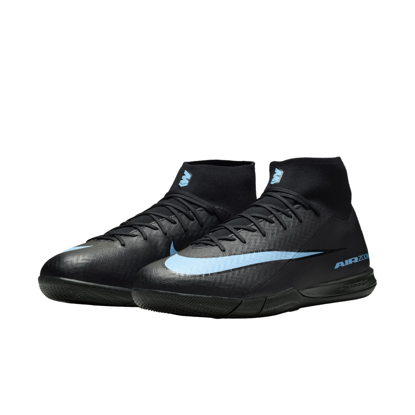 A pair of black Nike indoor soccer shoes with light blue accents and a high-top ankle collar against a black background.