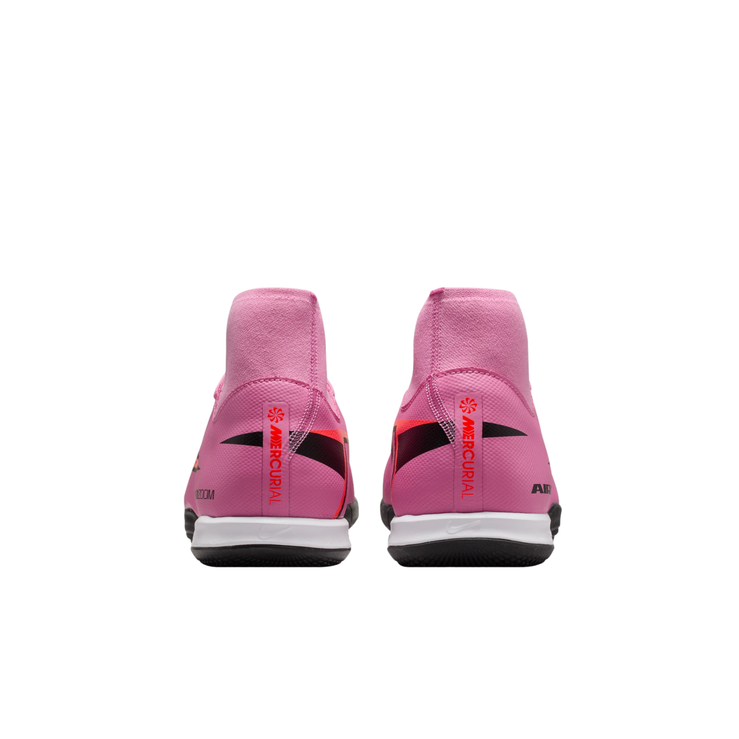 Rear view of pink Nike Mercurial soccer shoes with high-top collars and white soles on a black background.