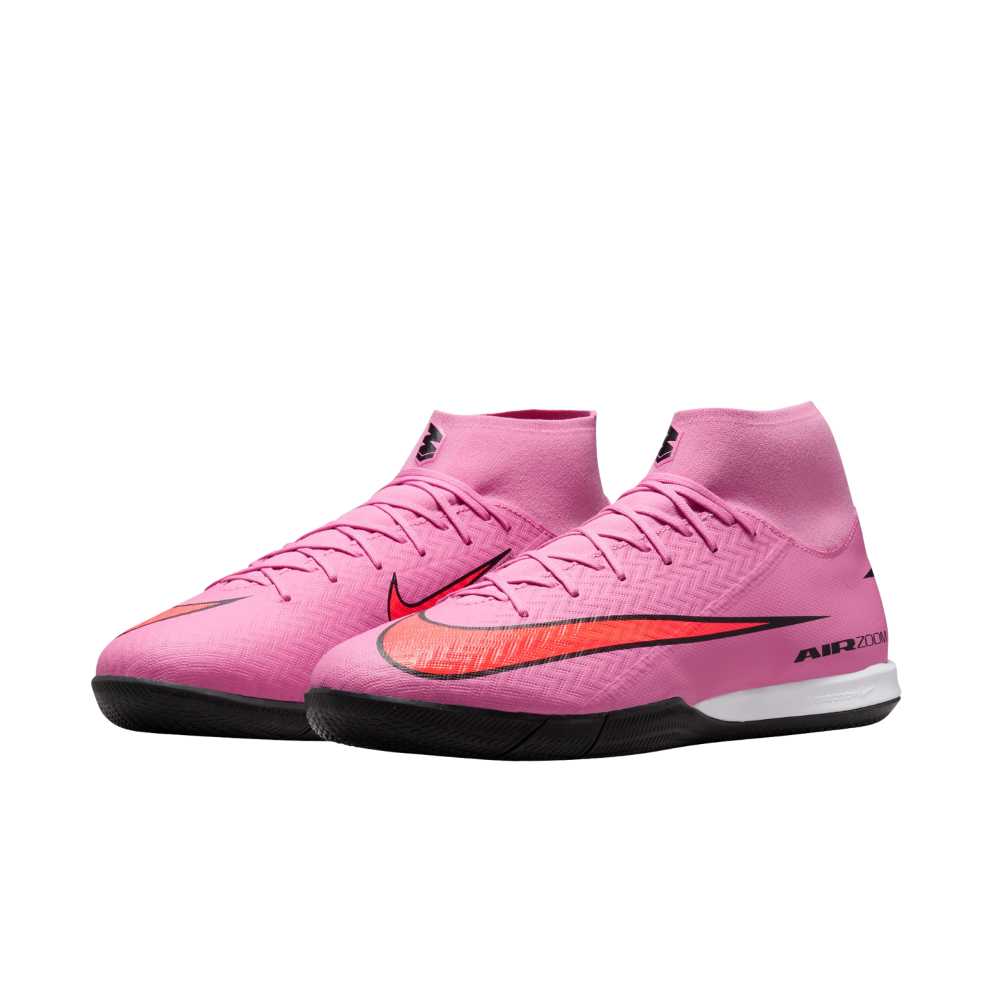 Pair of pink Nike Air Zoom soccer shoes with high-top collars and black soles, set against a black background.