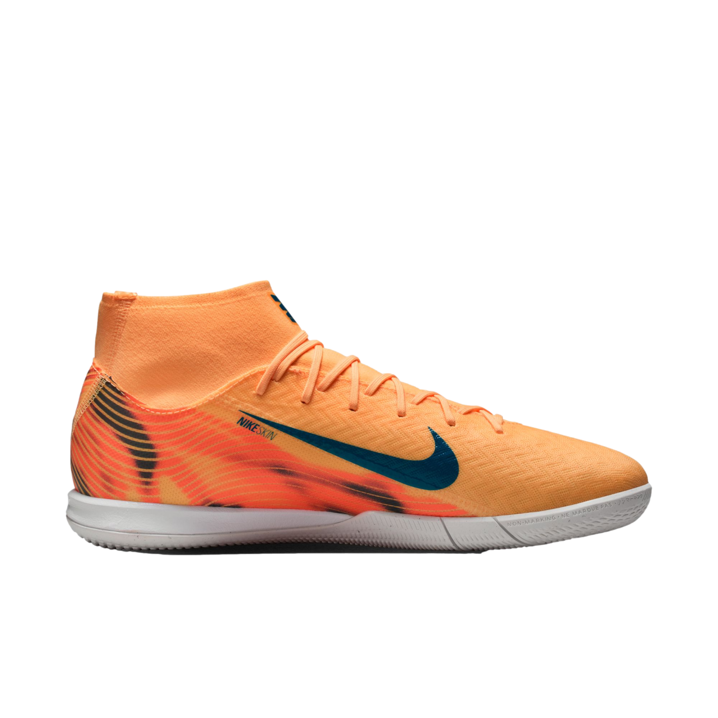 An orange Nike high-top indoor soccer shoe with a blue swoosh and patterned heel, shown in profile against a black background.