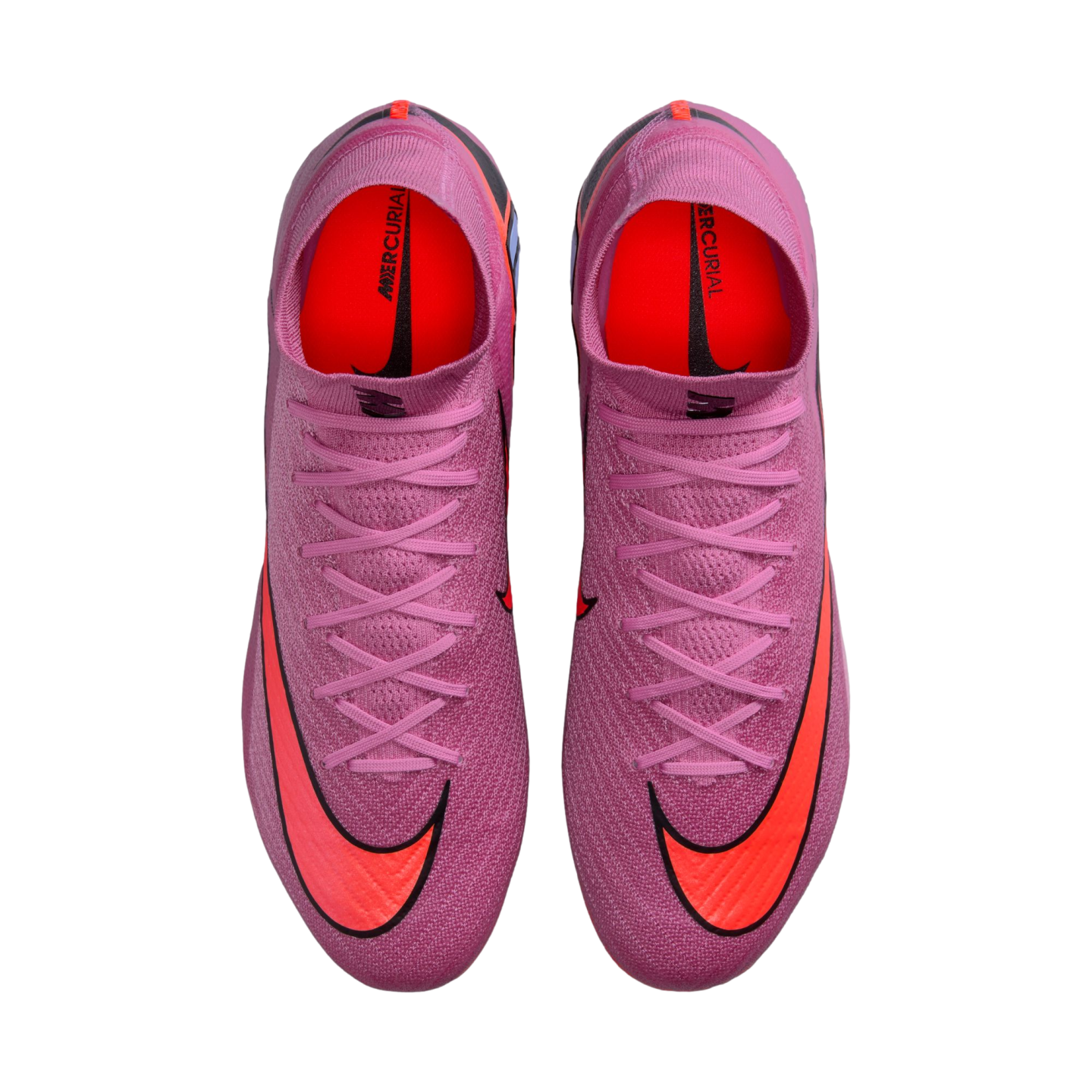 Top-down view of pink textured Nike Mercurial soccer cleats with large orange swooshes and pink laces, set against a black background.