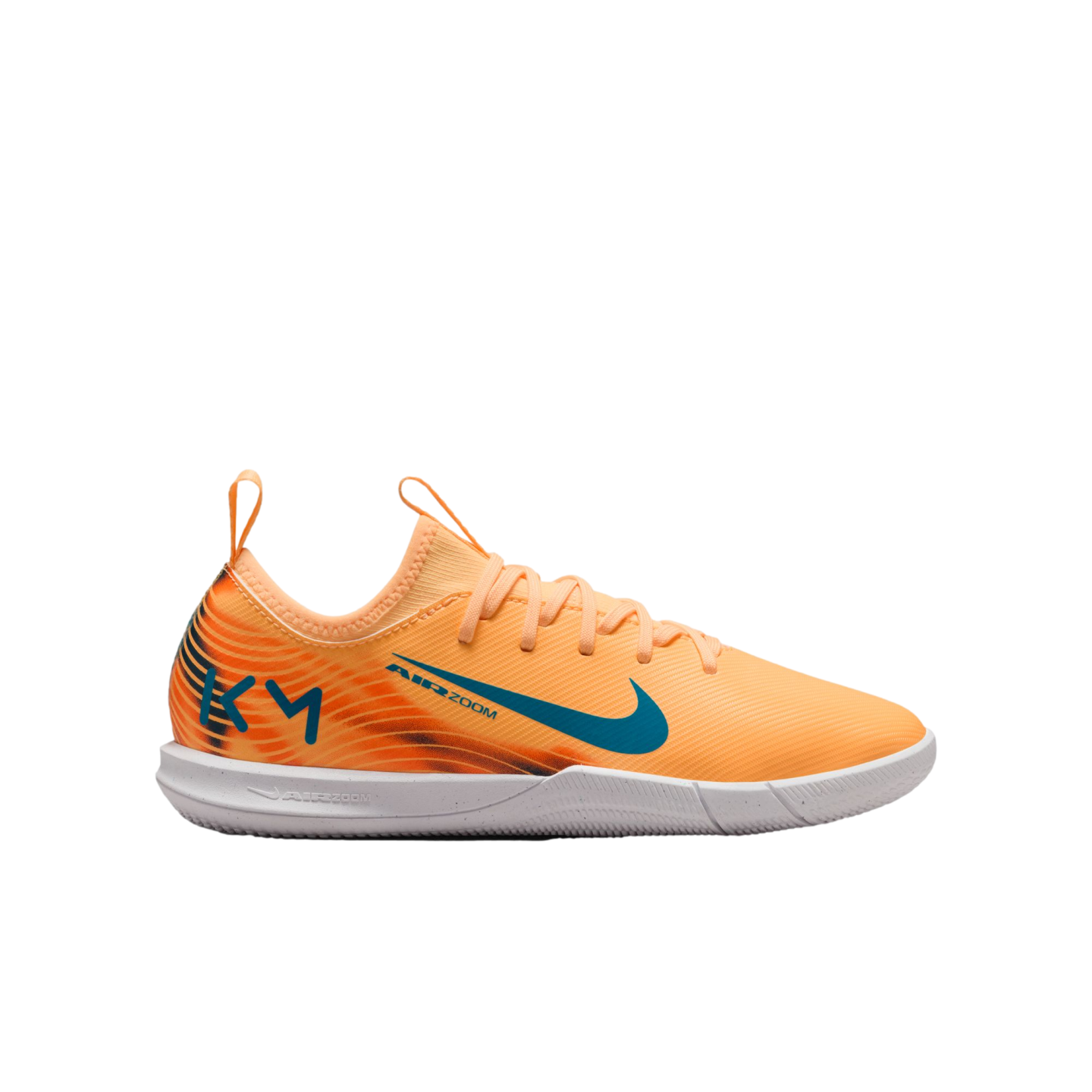 Bright orange Nike Air Zoom soccer shoe with a blue swoosh, "KM" logo on the heel, and a white speckled sole.