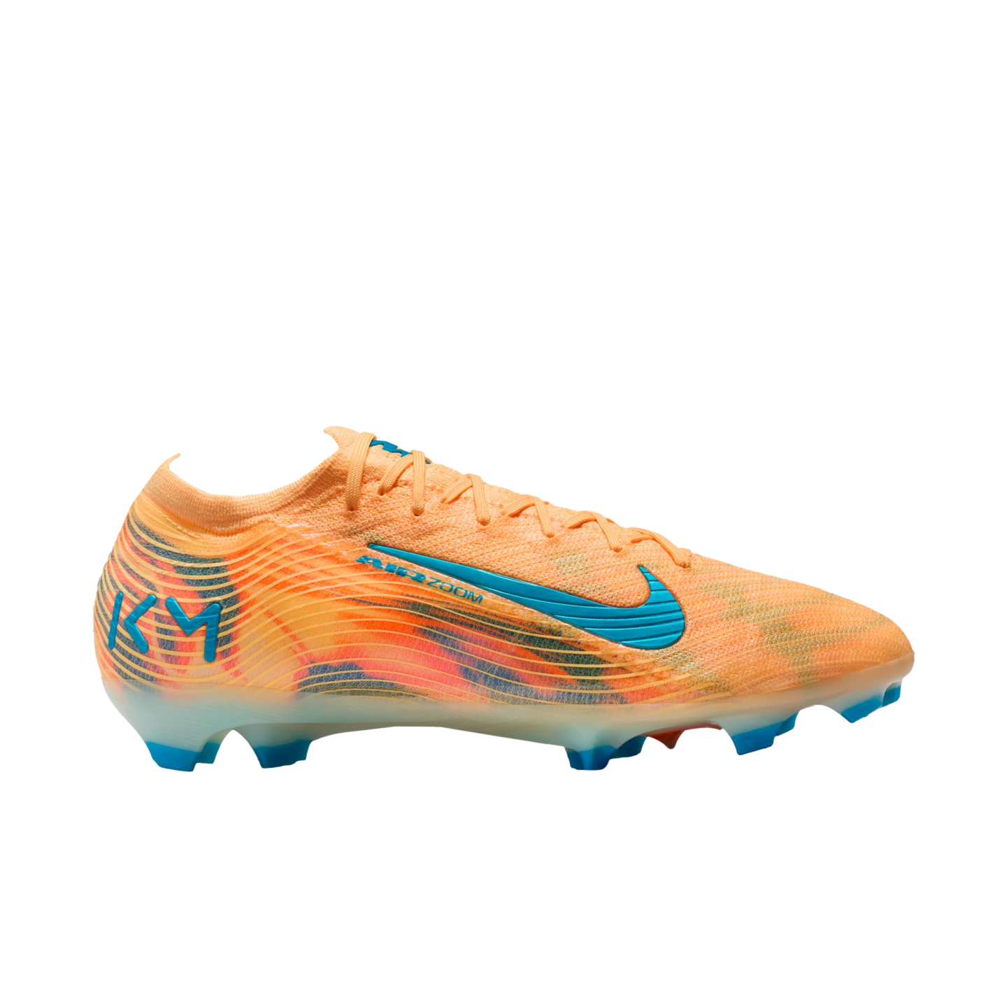 Side profile of an orange Nike soccer cleat with blue details and 'KM' logo on the heel, set against a black background.