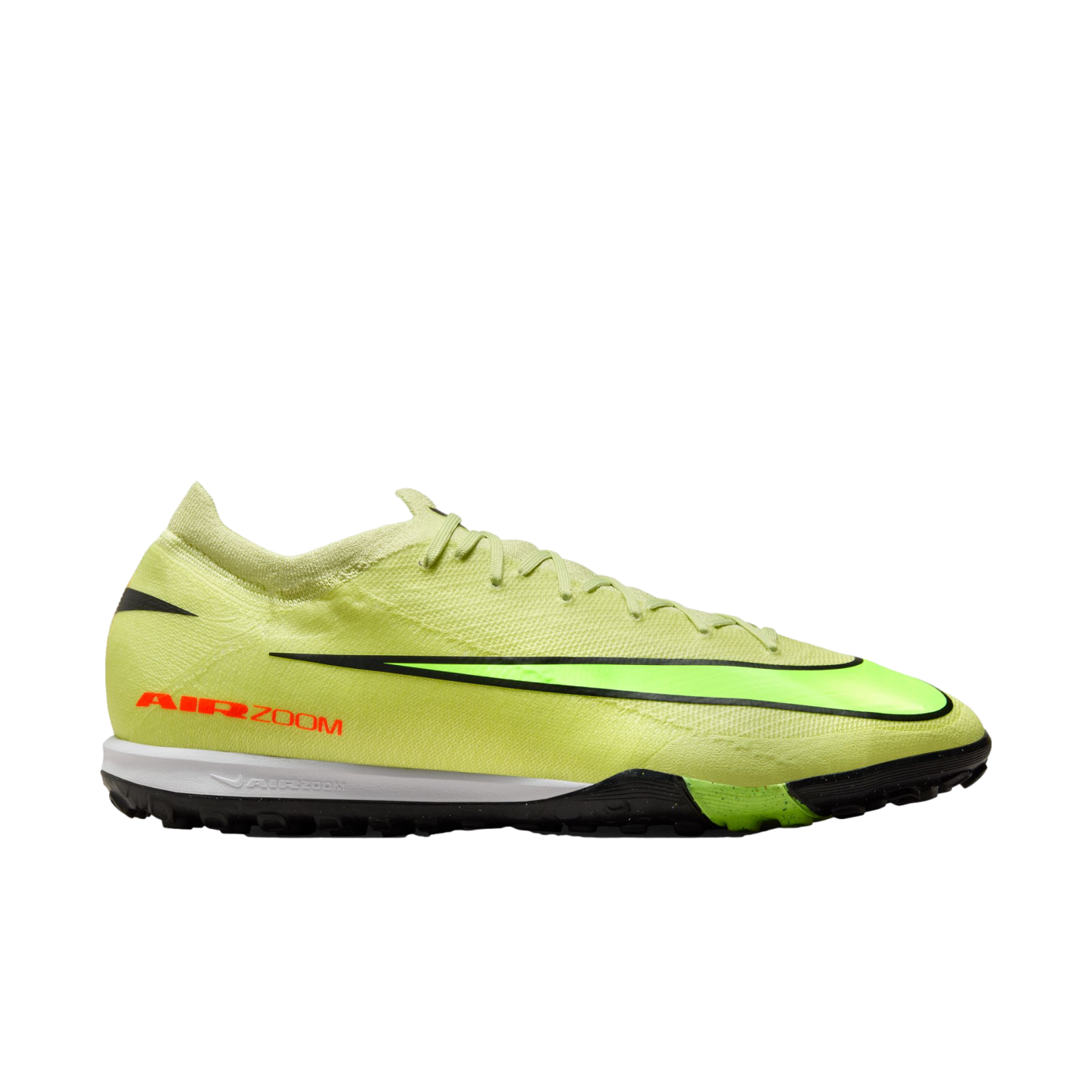Profile view of a lime green Nike Air Zoom turf soccer shoe with a black and neon green swoosh and red branding, isolated against a black background.