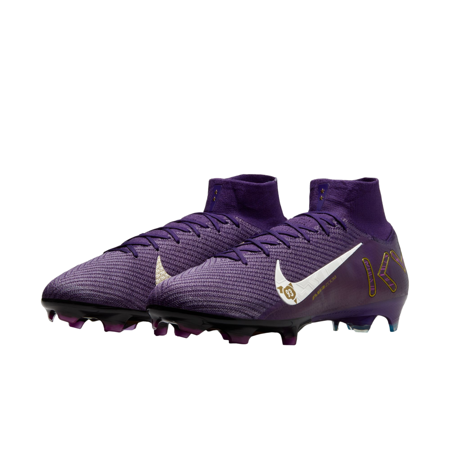 Pair of purple Nike soccer cleats with high collars, a white swoosh with gold accents, and gold KM branding on the heel.