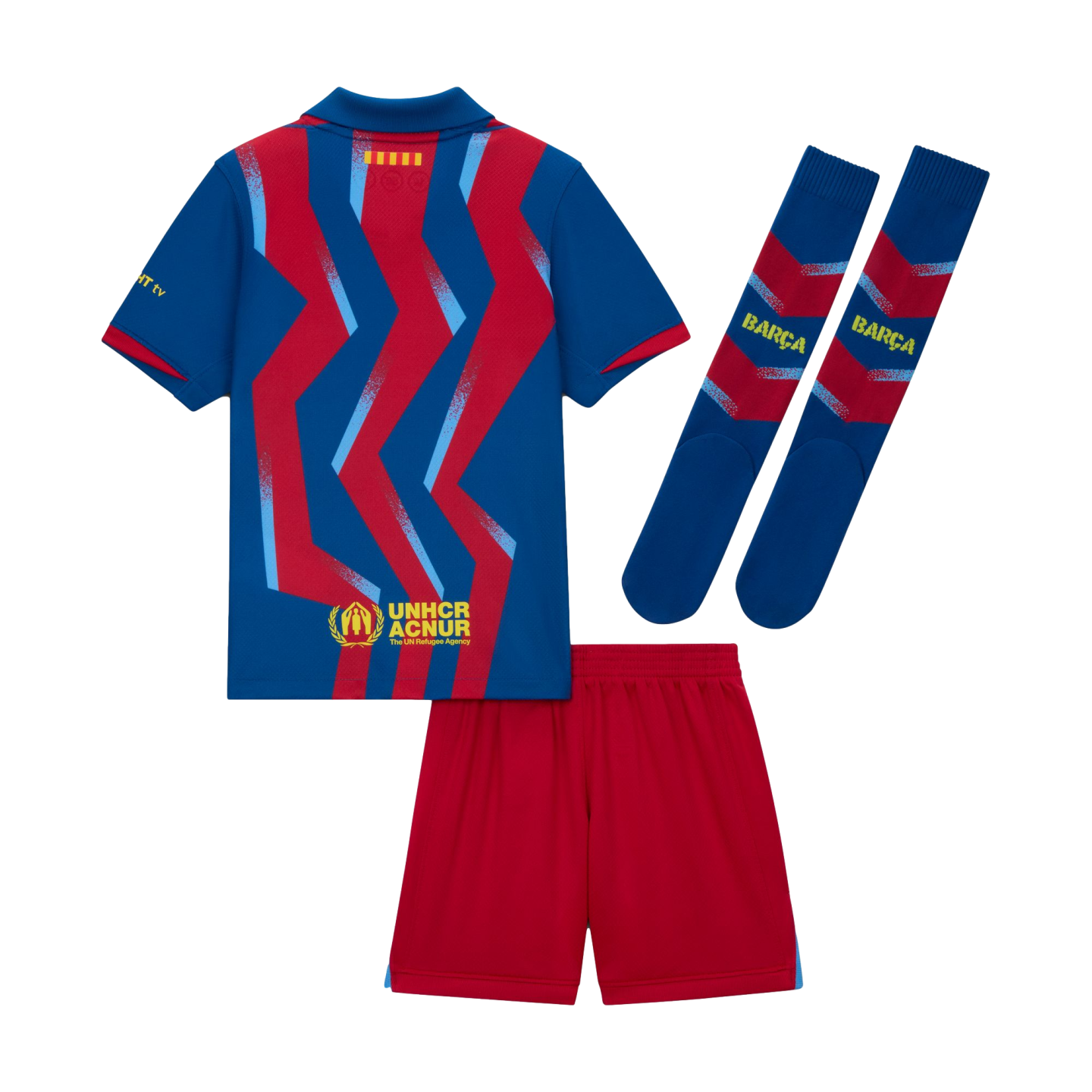 Back view of an FC Barcelona soccer kit featuring a blue jersey with red zig-zag patterns, solid red shorts, and matching blue and red socks.