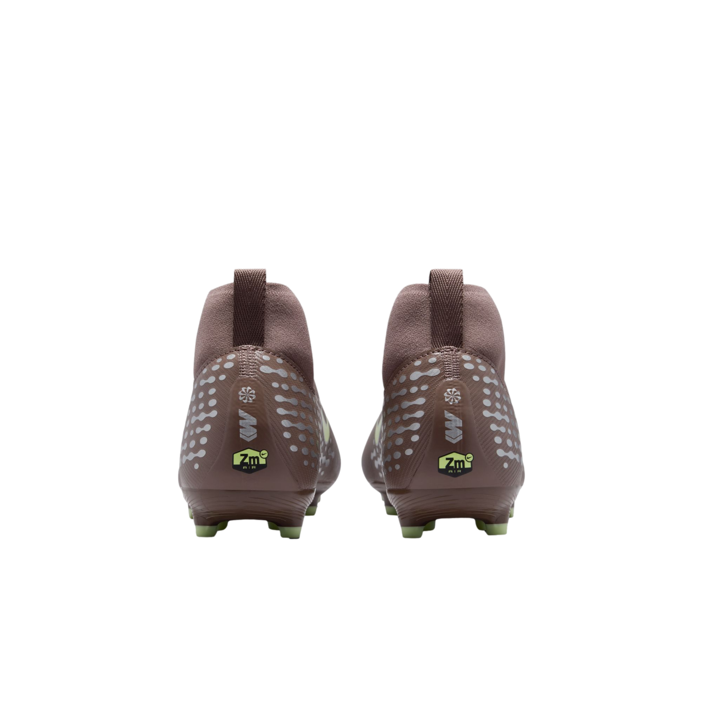 Rear view of two brown Nike Mercurial soccer cleats with silver dot patterns, "Zm Air" logos on the heels, and lime green studs against a black background.