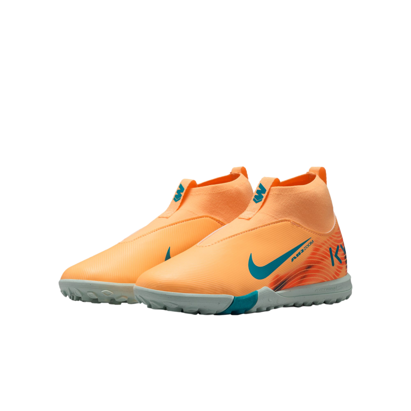 A pair of orange, laceless Nike Air Zoom soccer shoes with teal accents and KM branding, shown against a solid black background.