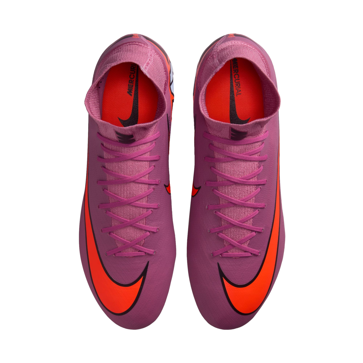 Top-down view of pink Nike Mercurial soccer cleats with bright orange swooshes and high-top collars against a black background.