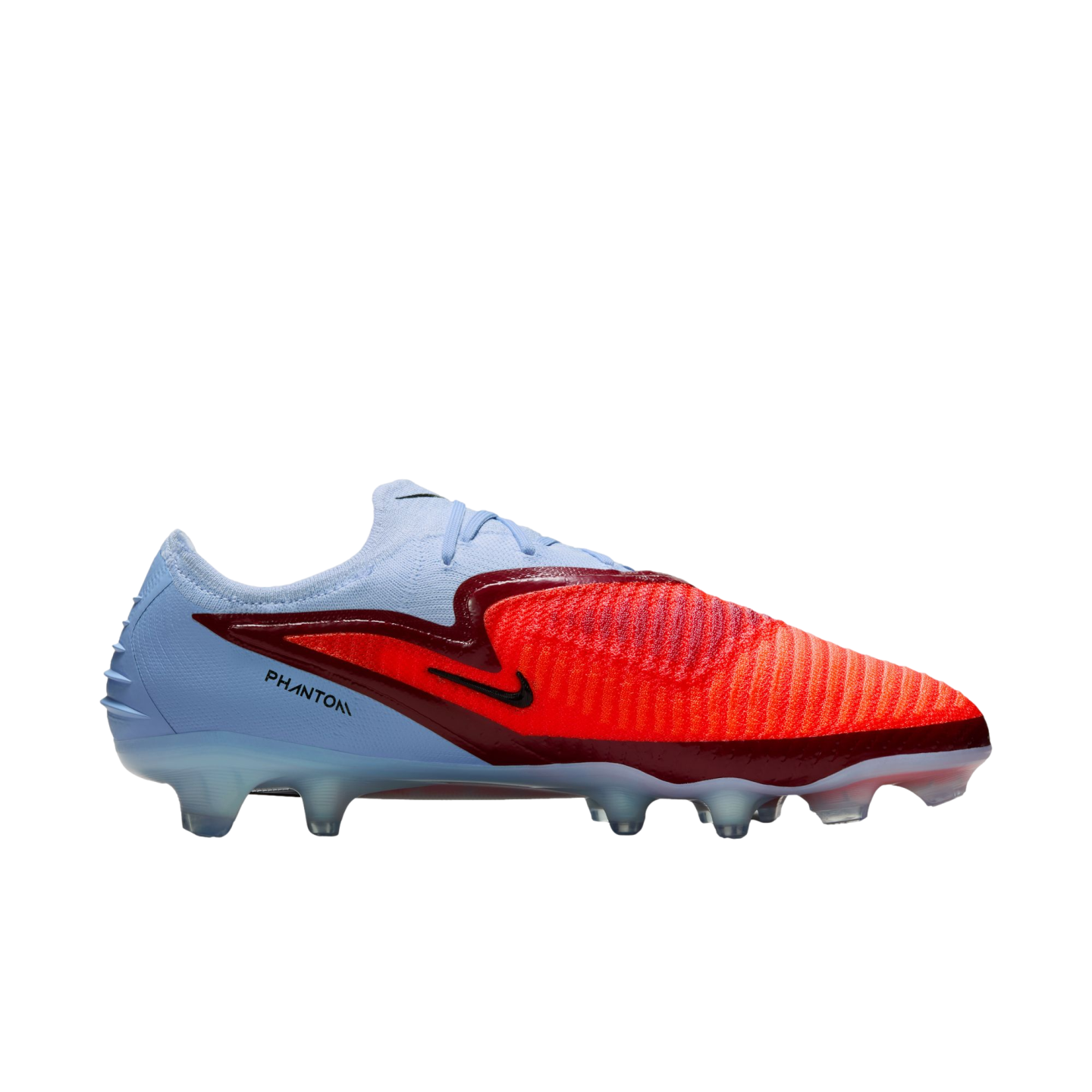 Side profile of a Nike Phantom soccer cleat with a light blue heel, vibrant orange textured forefoot, and dark red accents, set against a black background.