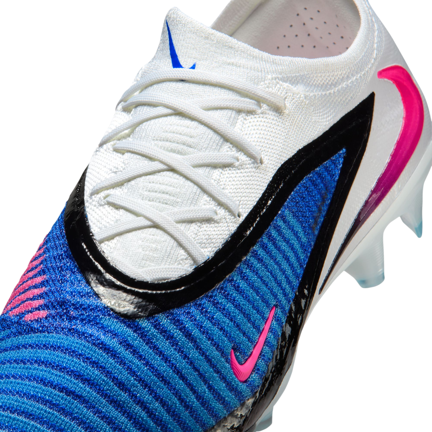 Close-up of a Nike Phantom GX soccer boot featuring a white knit collar, textured blue upper, and a pink swoosh.