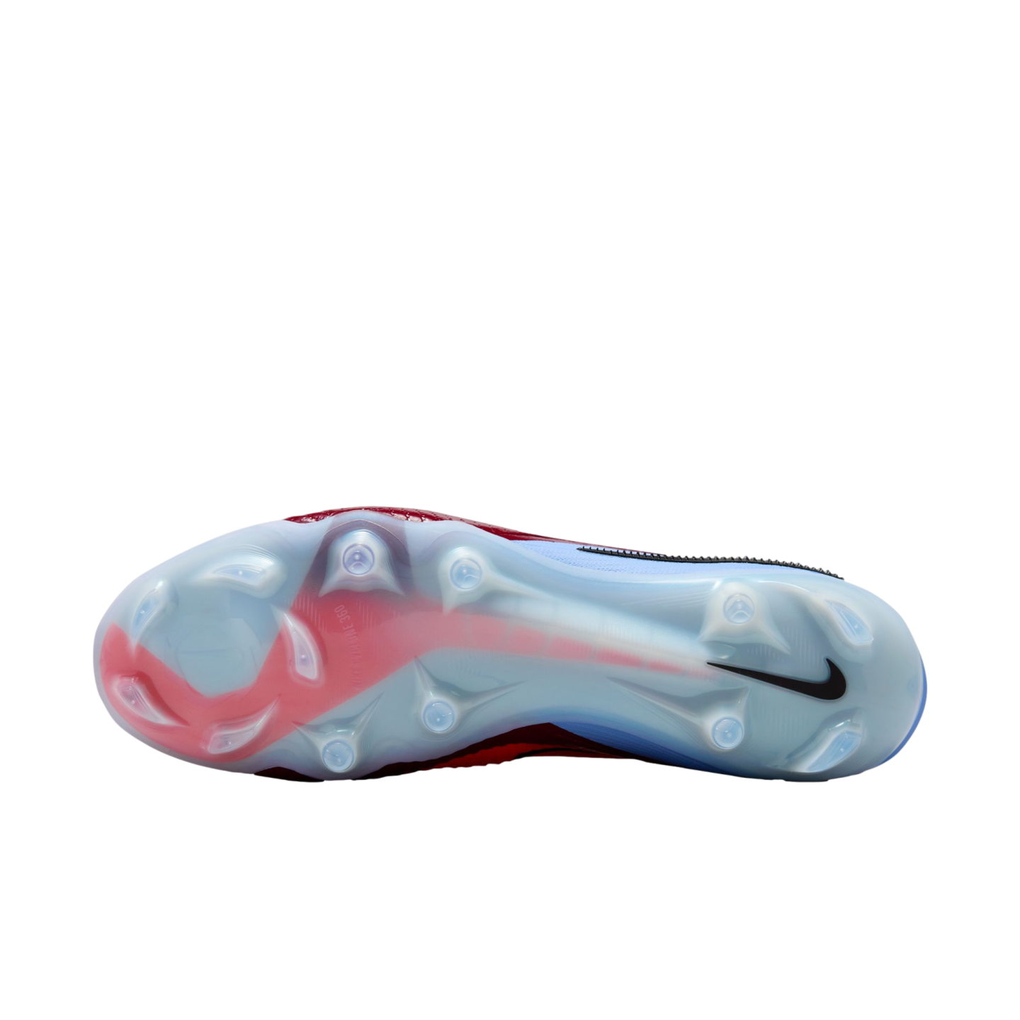 Bottom view of a light blue and red Nike soccer cleat with translucent traction studs against a black background.