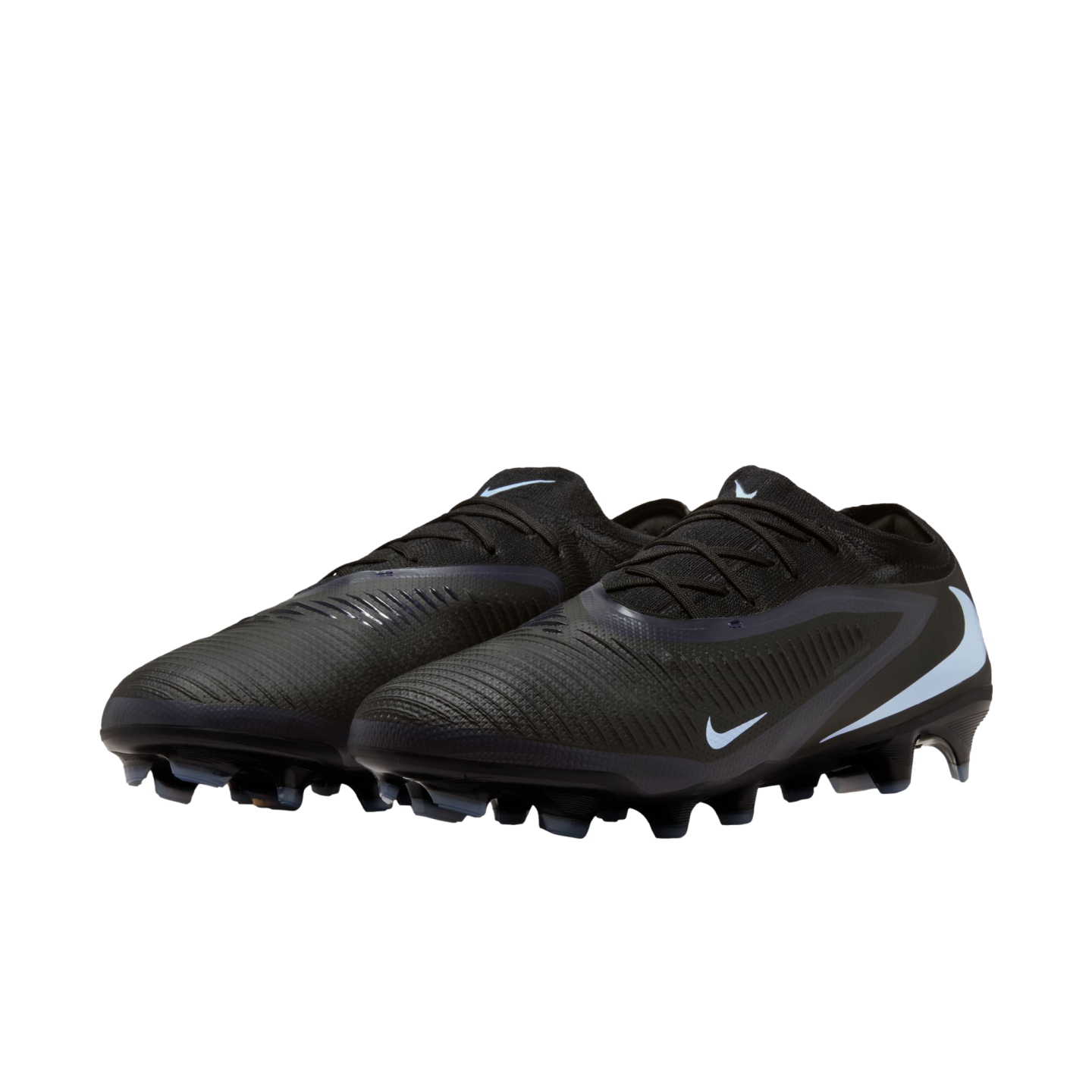 A pair of black Nike soccer cleats with light blue accents and textured uppers, set against a solid black background.