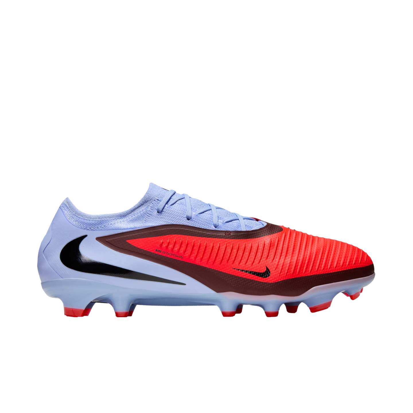Profile view of a Nike soccer cleat with a light blue heel and a vibrant red, textured forefoot. Features a black swoosh and red studs against a black background.