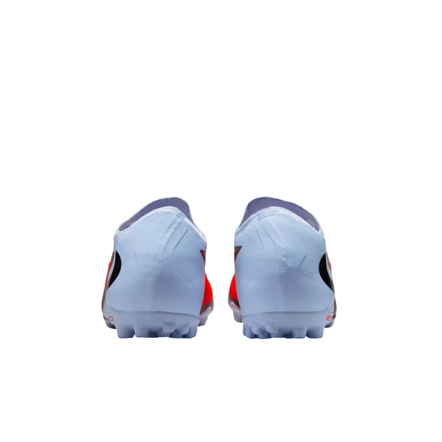 Rear view of light blue Nike turf soccer cleats with orange accents on a black background.