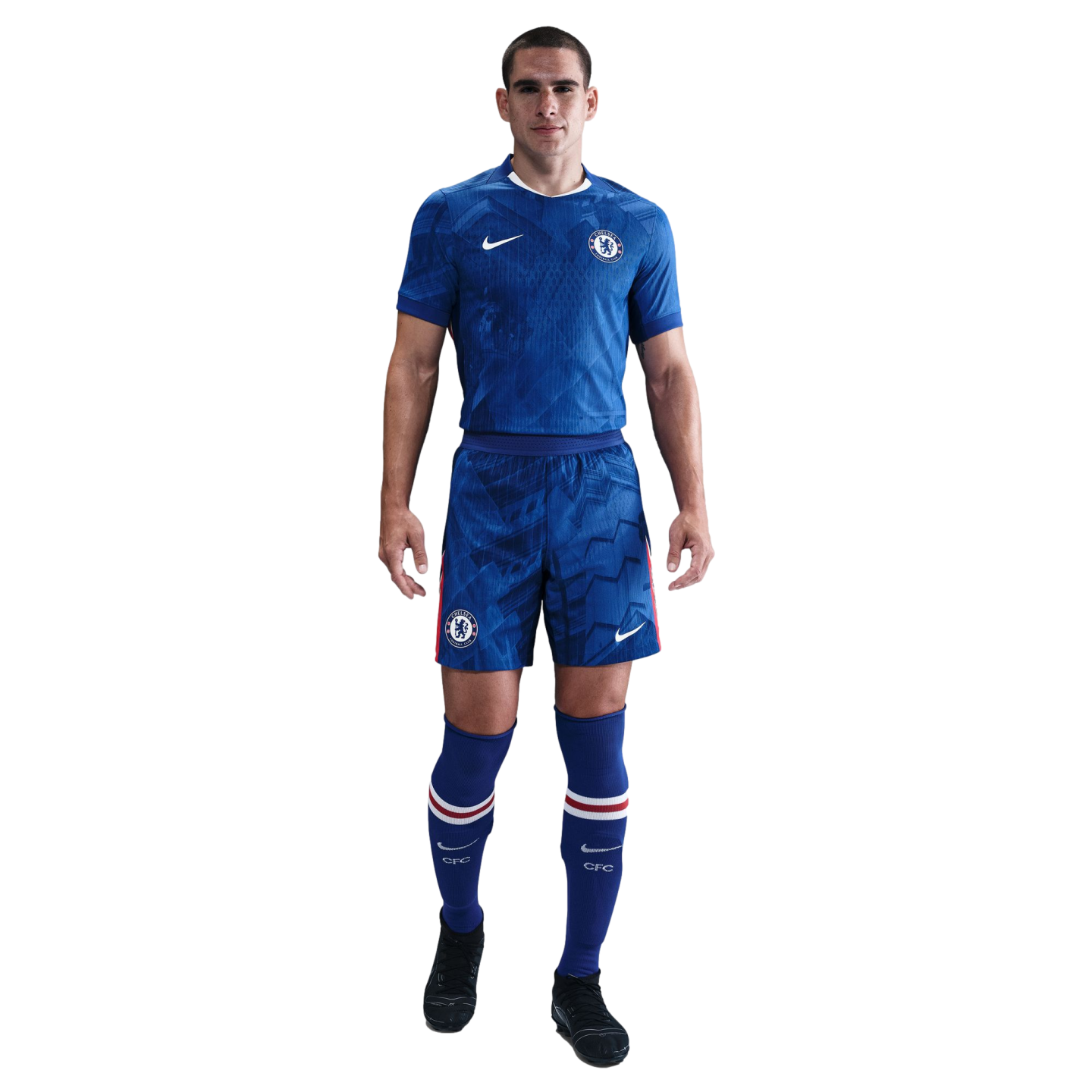 A male athlete models a blue Chelsea FC home soccer uniform against a white background.