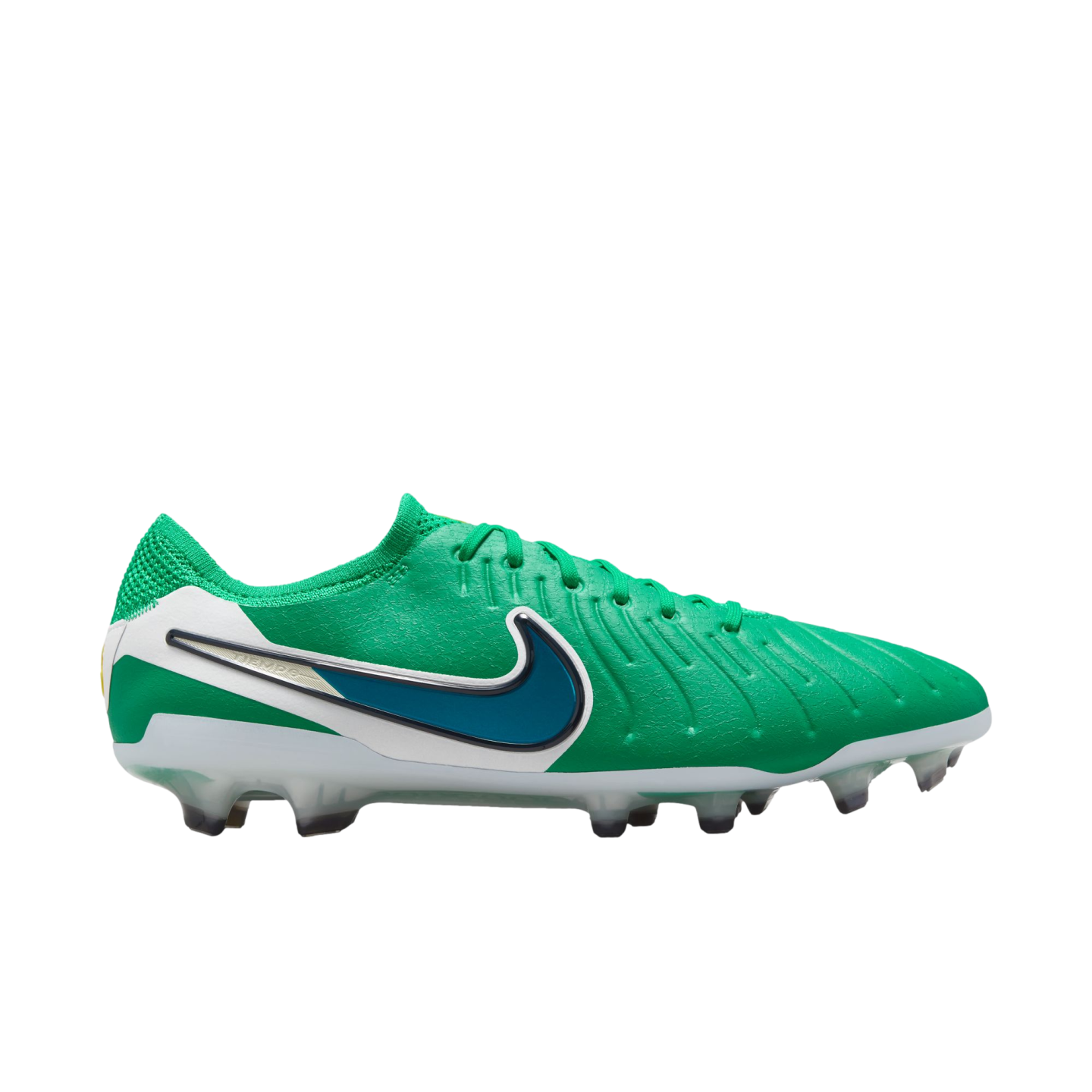 Side profile of a green Nike Tiempo soccer cleat with white details, a teal Nike swoosh, and a studded sole against a white background.