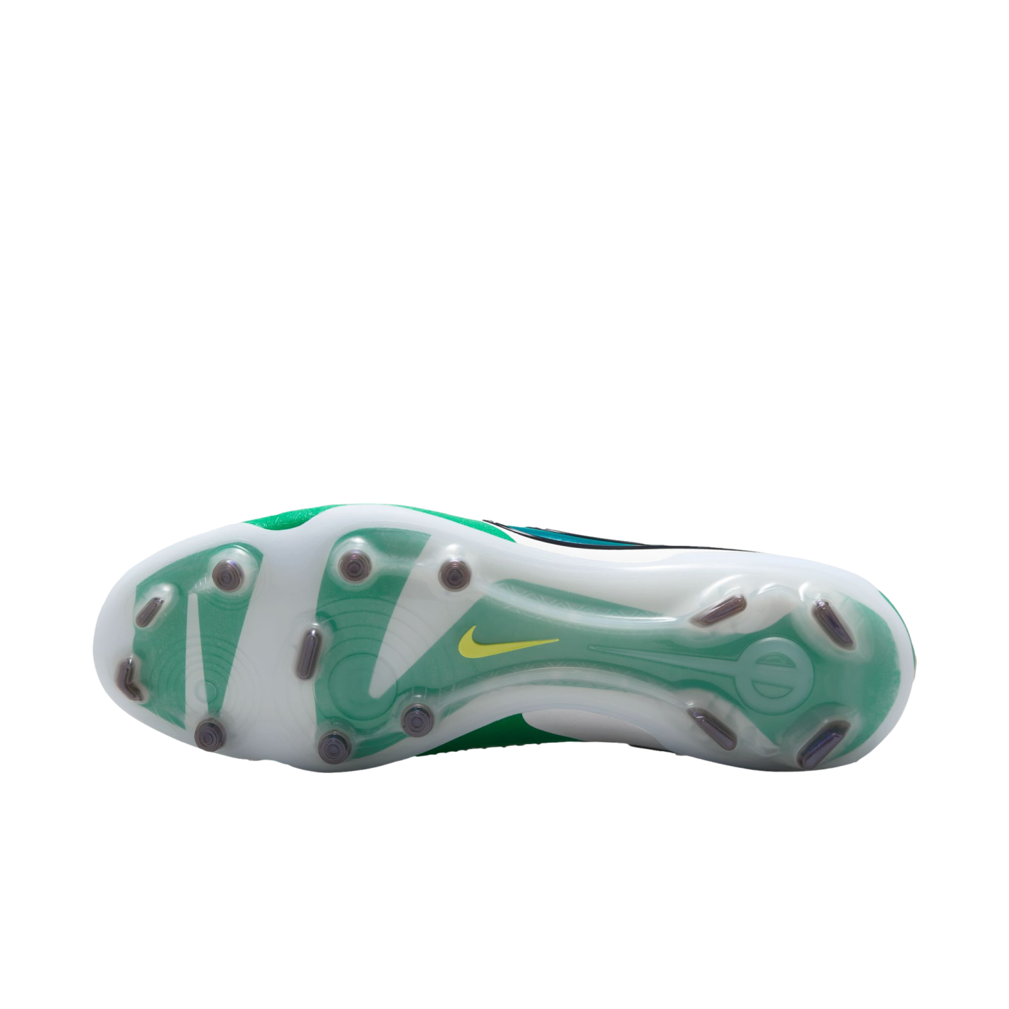 Outsole of a white and green Nike soccer cleat featuring translucent studs and a small yellow swoosh on a white background.