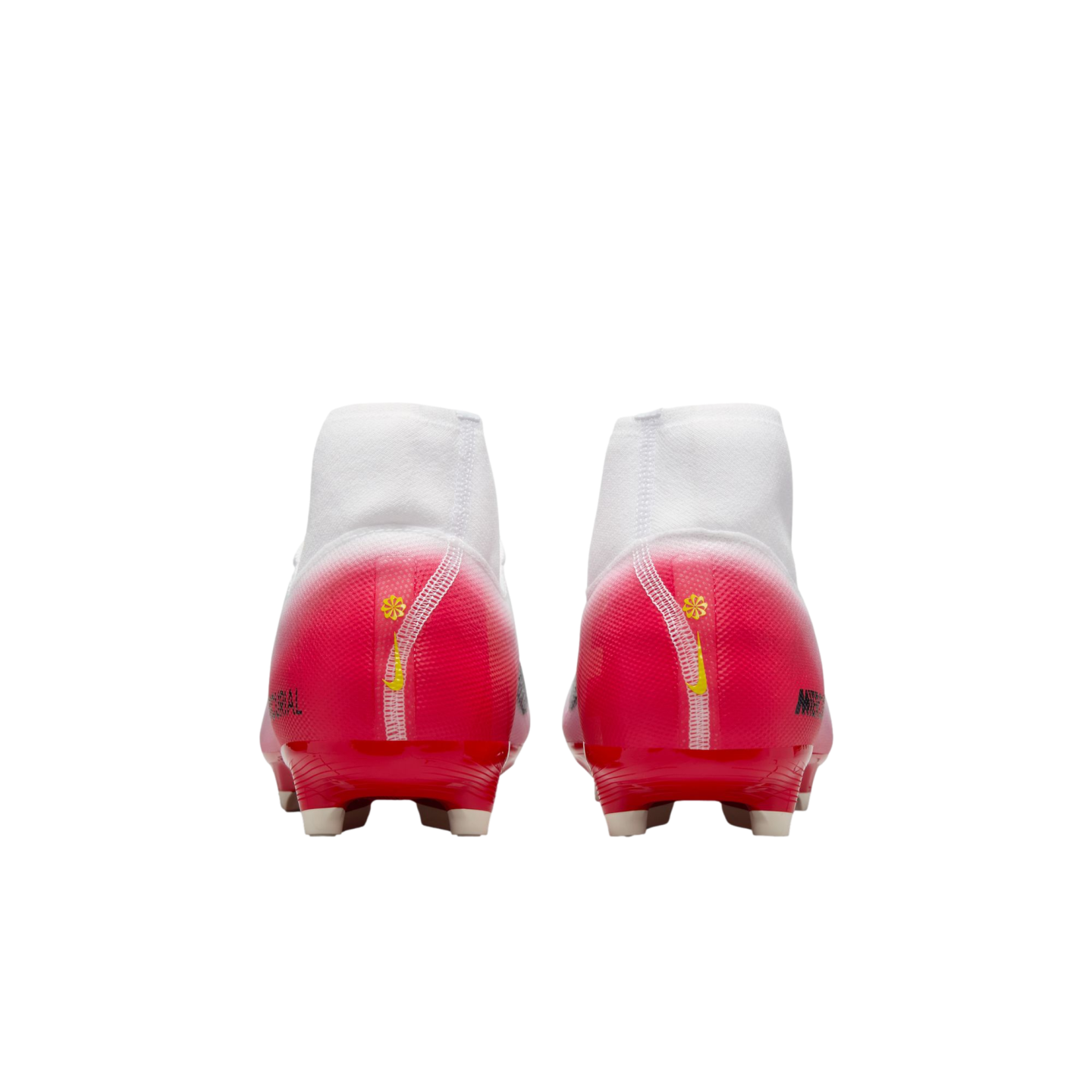 Rear view of Nike soccer cleats with a white high-top collar fading into a bright pink heel and red outsole, set against a black background.
