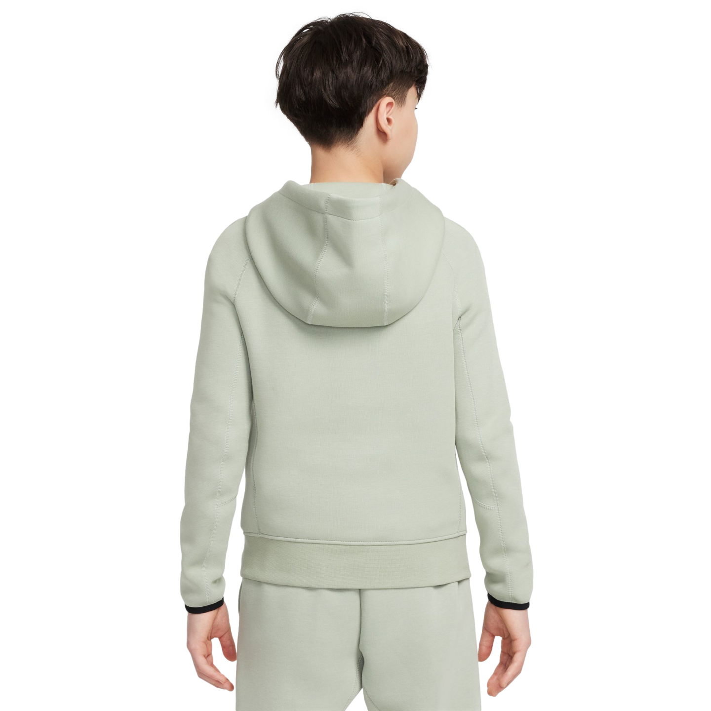Back view of a child wearing a light green tracksuit with black-trimmed cuffs against a plain white background.
